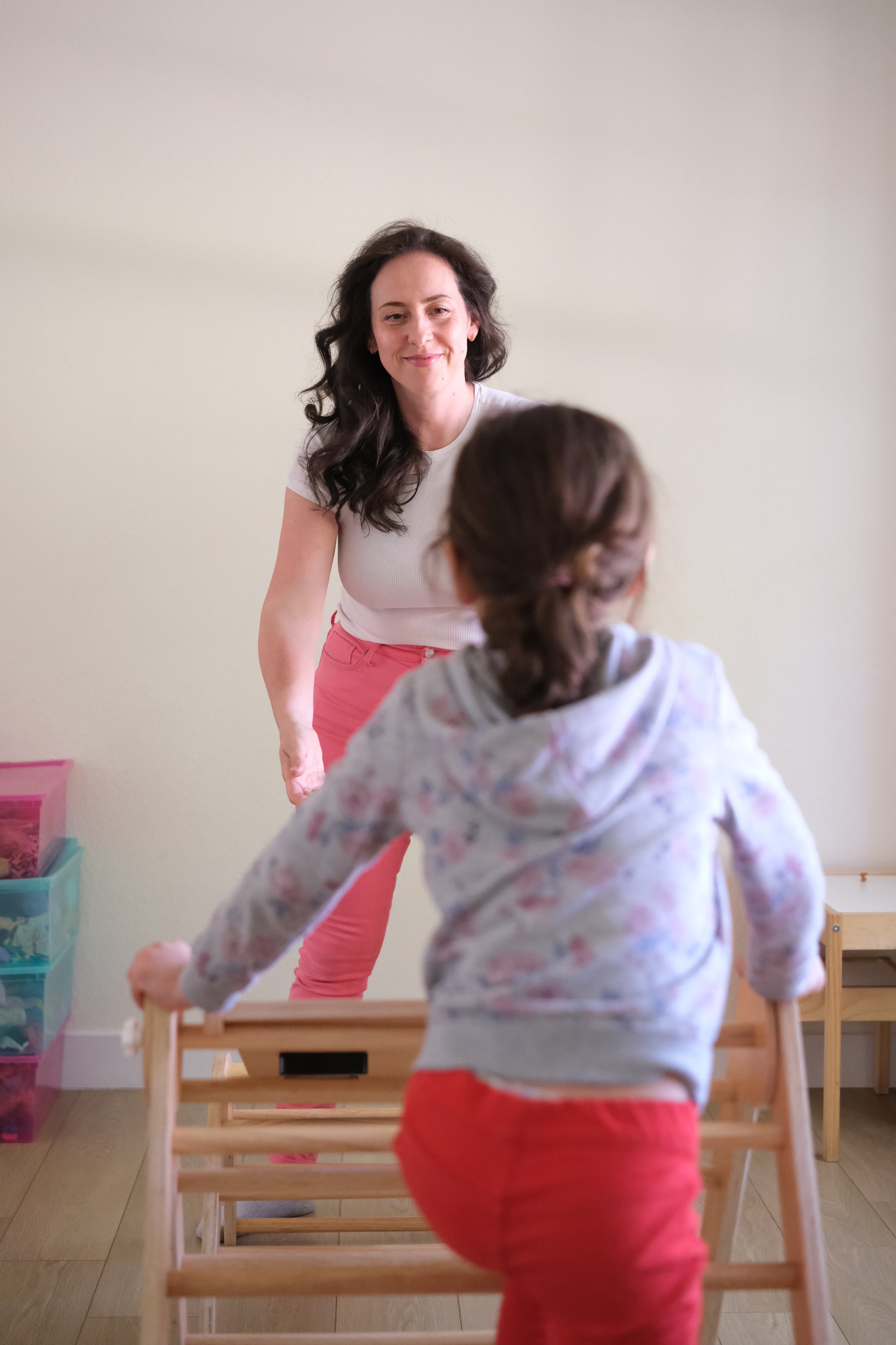 Yelena Letser speech therapist supporting homeschool child during play-based learning session in Flower Mound TX