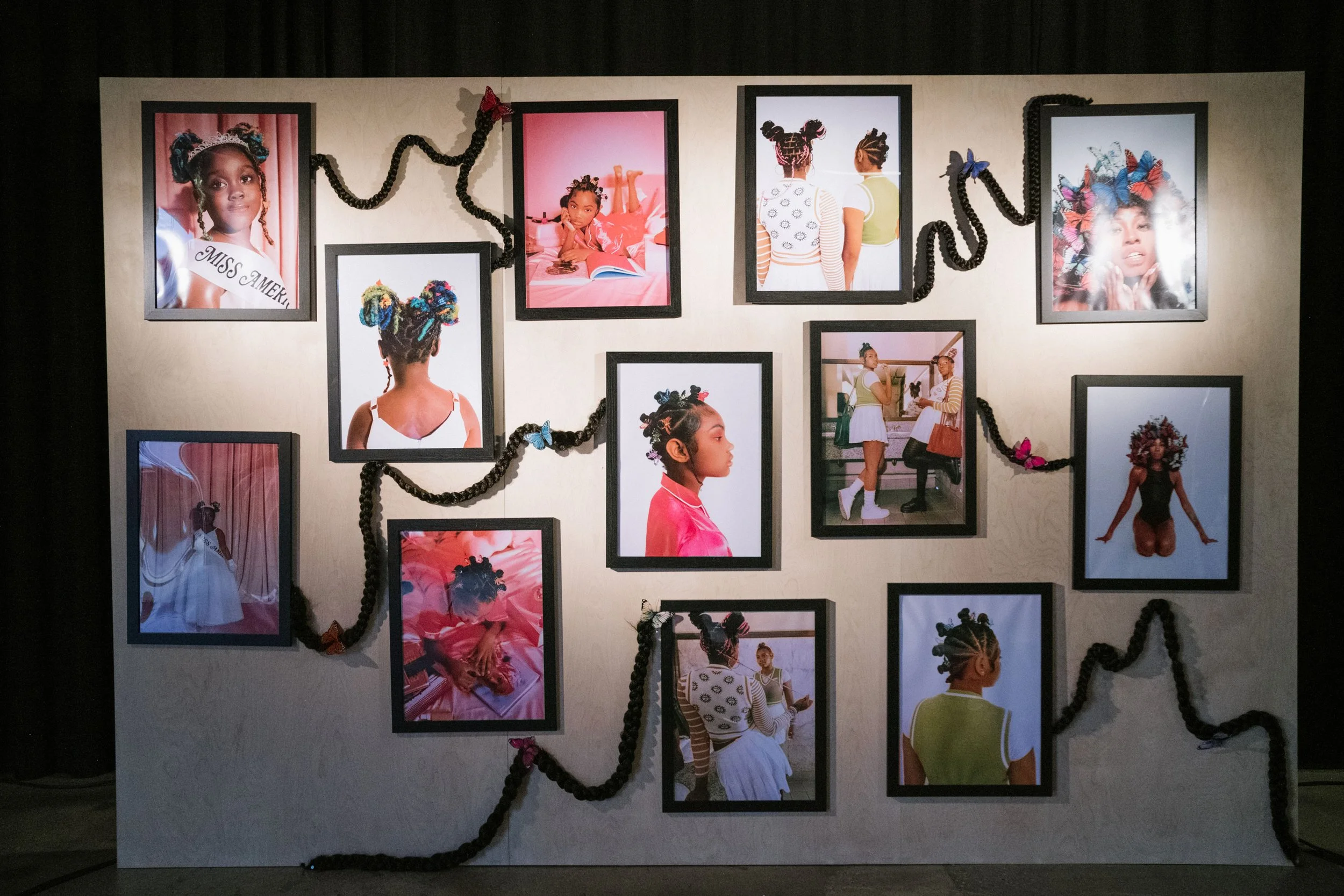 A collage of photographs featuring young girls with styled hair, dressed in colorful outfits, and posed in various settings, with decorative elements such as butterflies and braided cords.