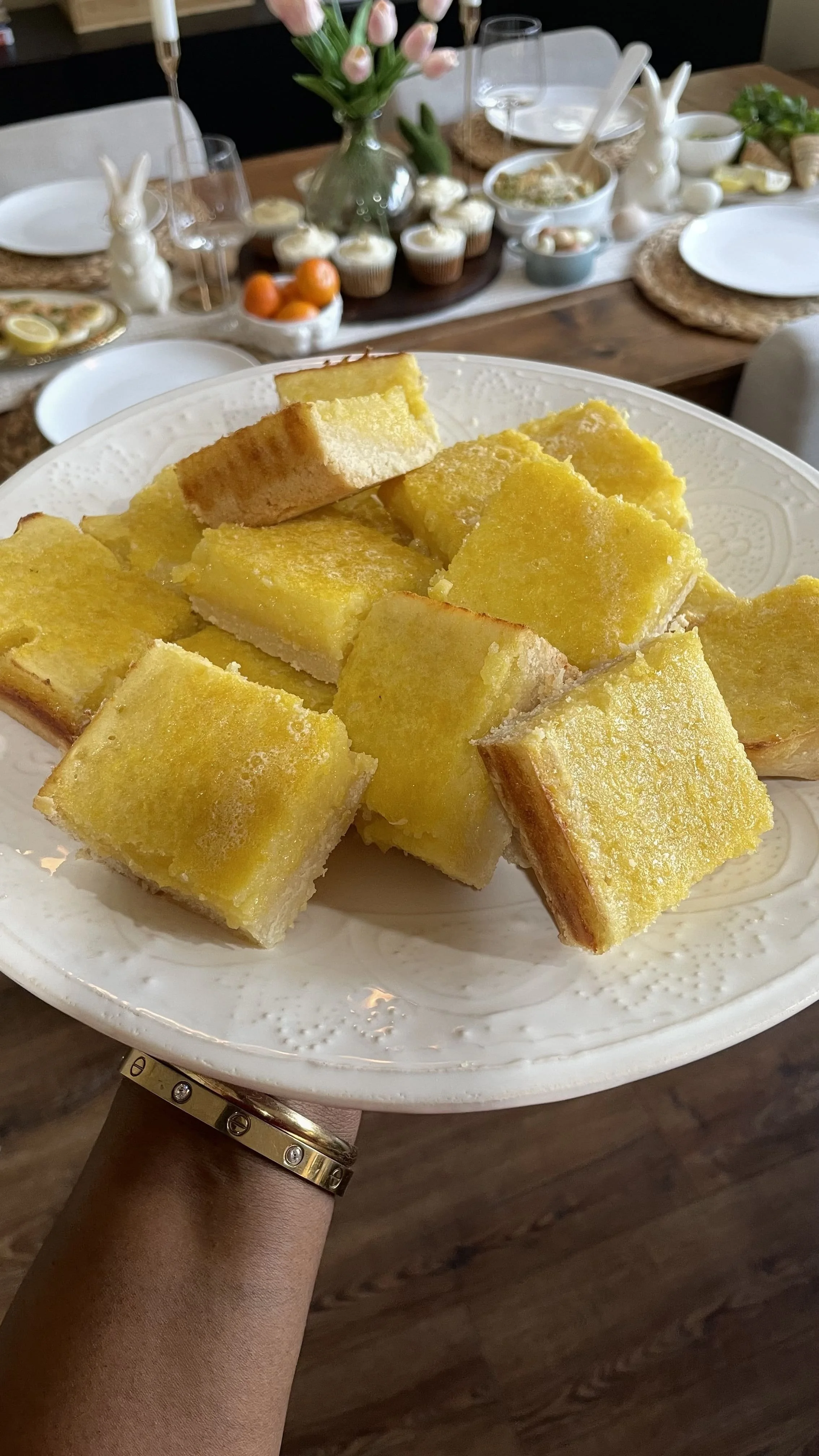 Close-up of homemade lemon bars with a buttery crust and smooth, golden lemon filling