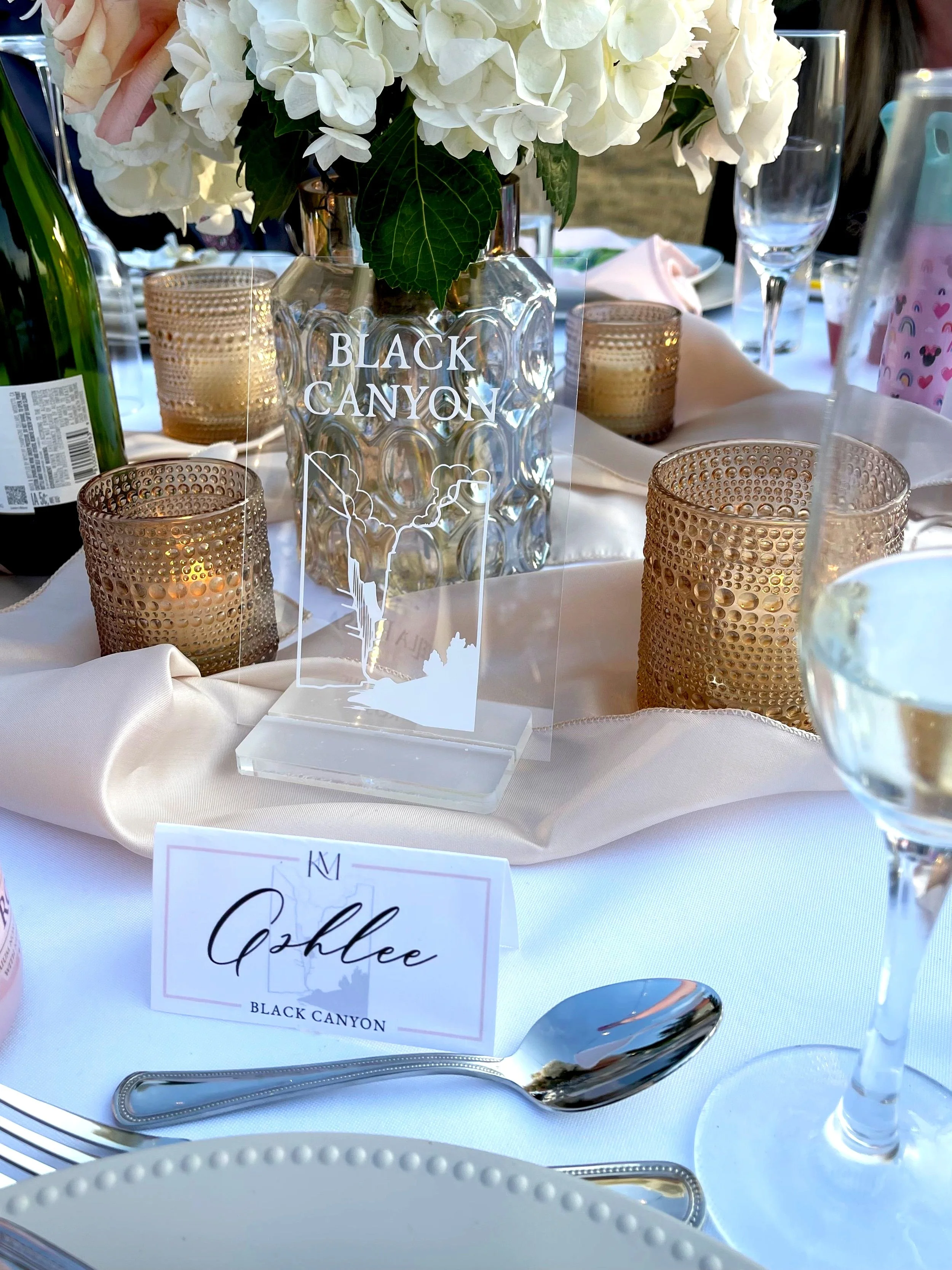 table name. made from clear acrylic and vinyl.