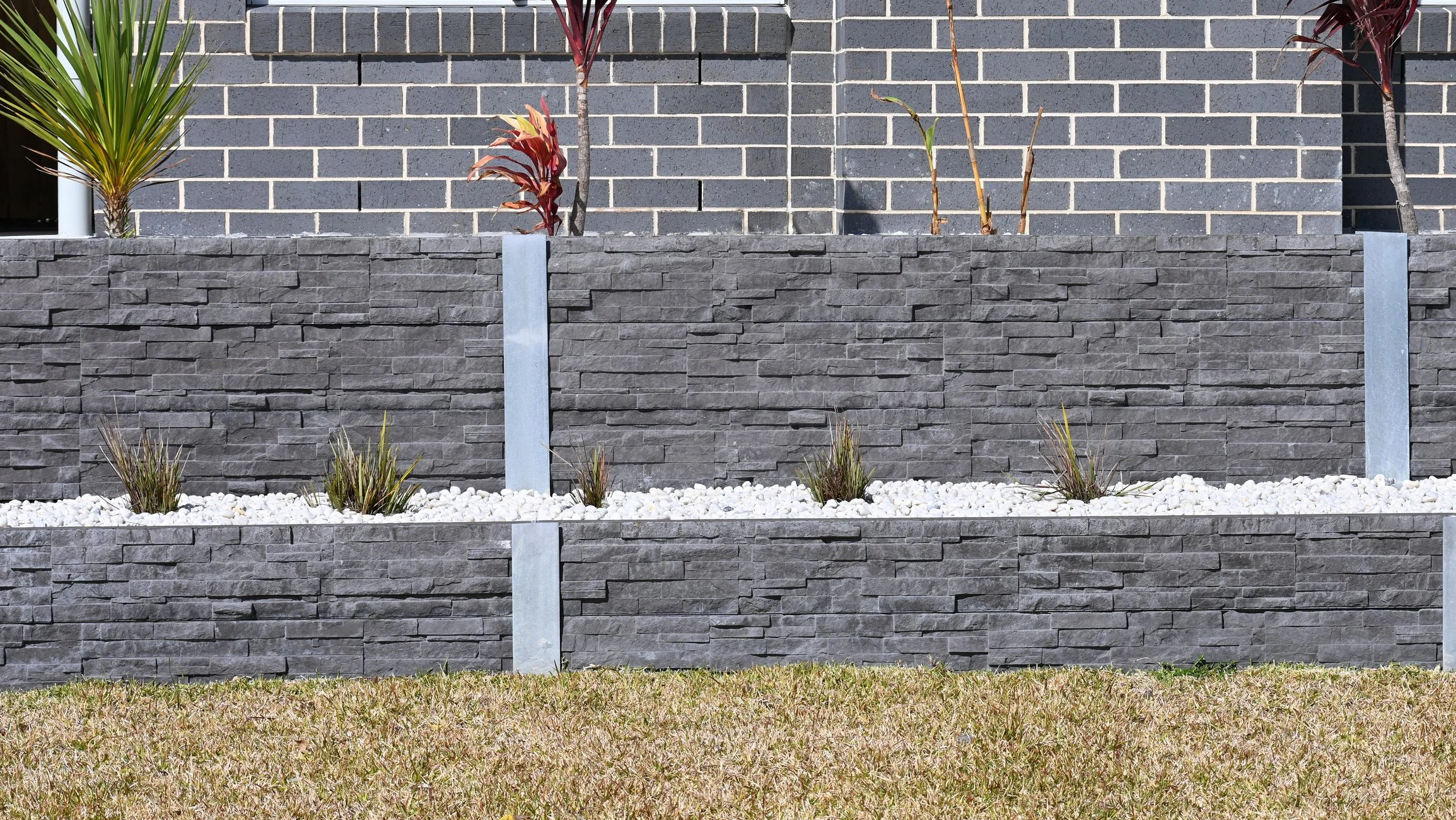 Concrete sleeper retaining wall construction in Albury–Wodonga