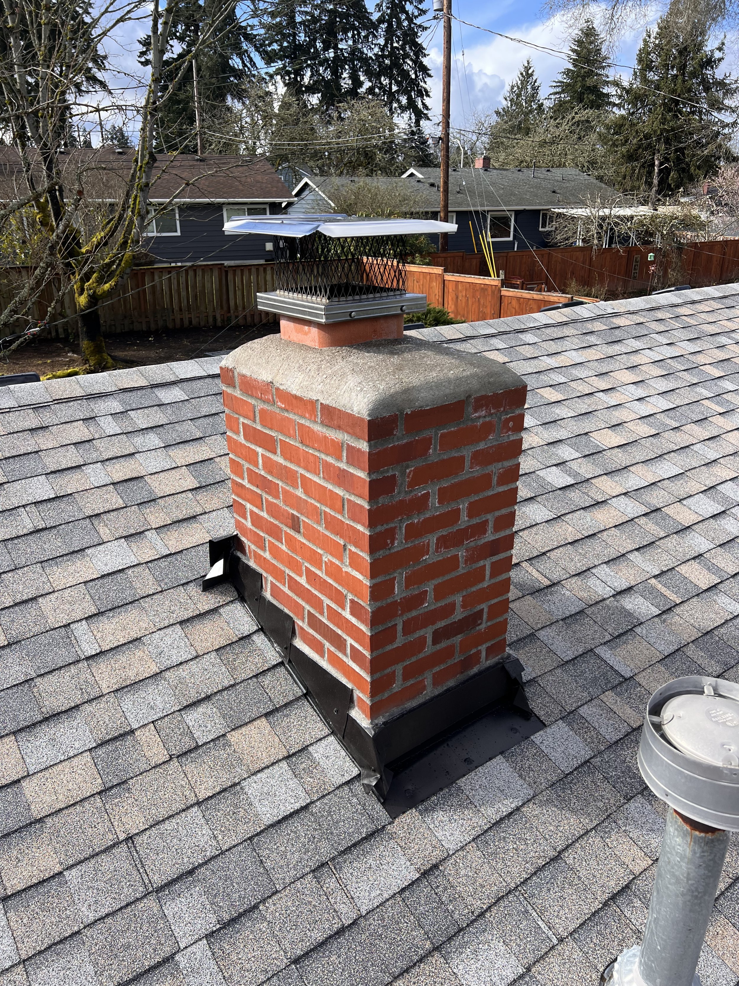 Chimney Tuckpointing and Concrete Cap Replacement & Installation
