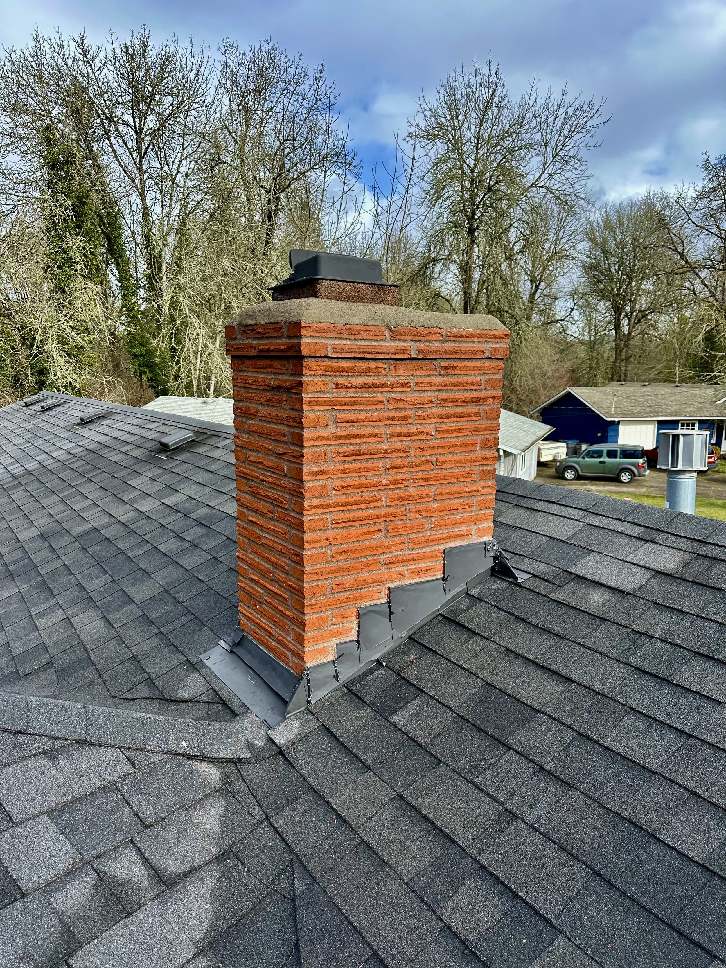 Chimney Tuckpointing & Fresh Concrete Cap Installation