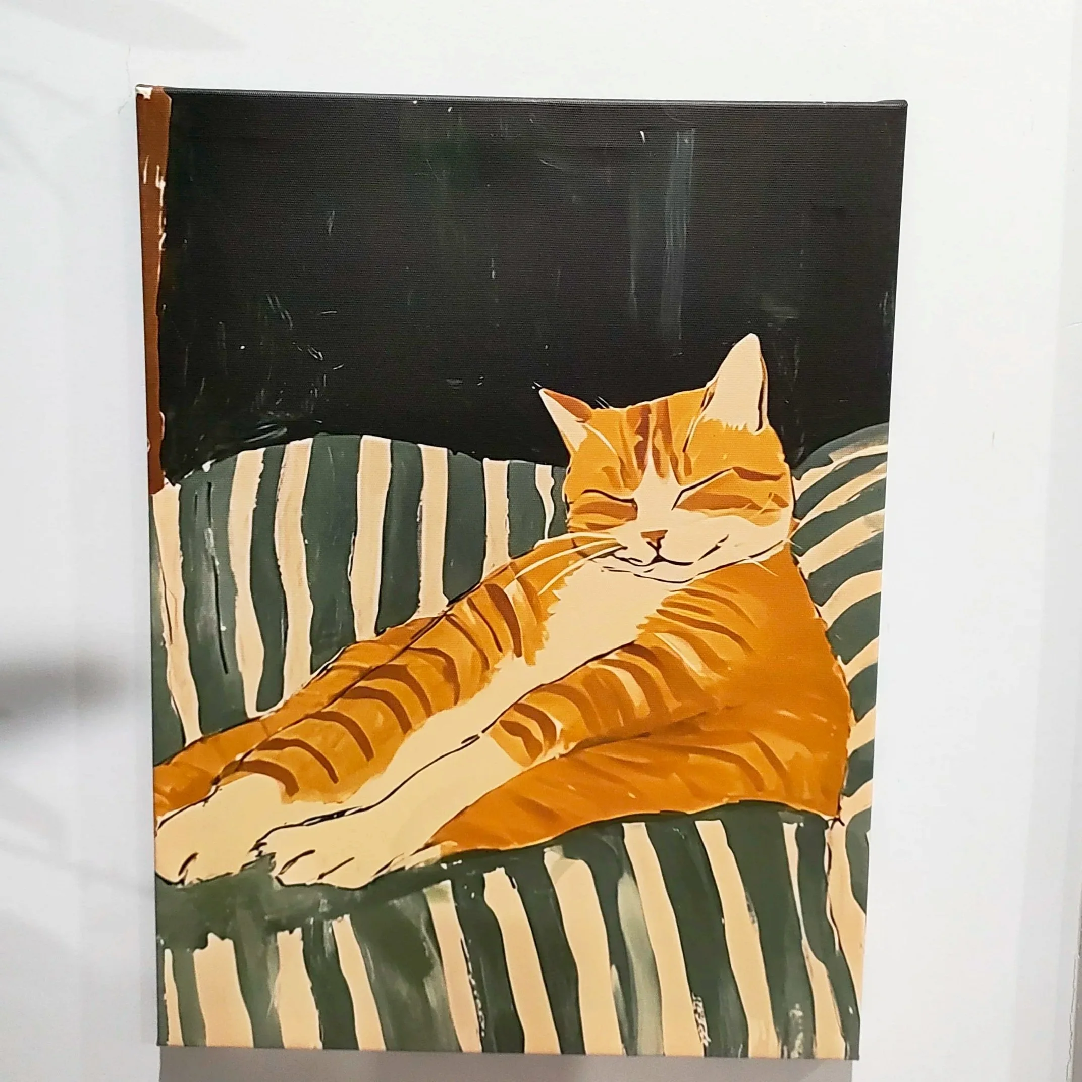 Ginger Cat on Couch Canvas Print