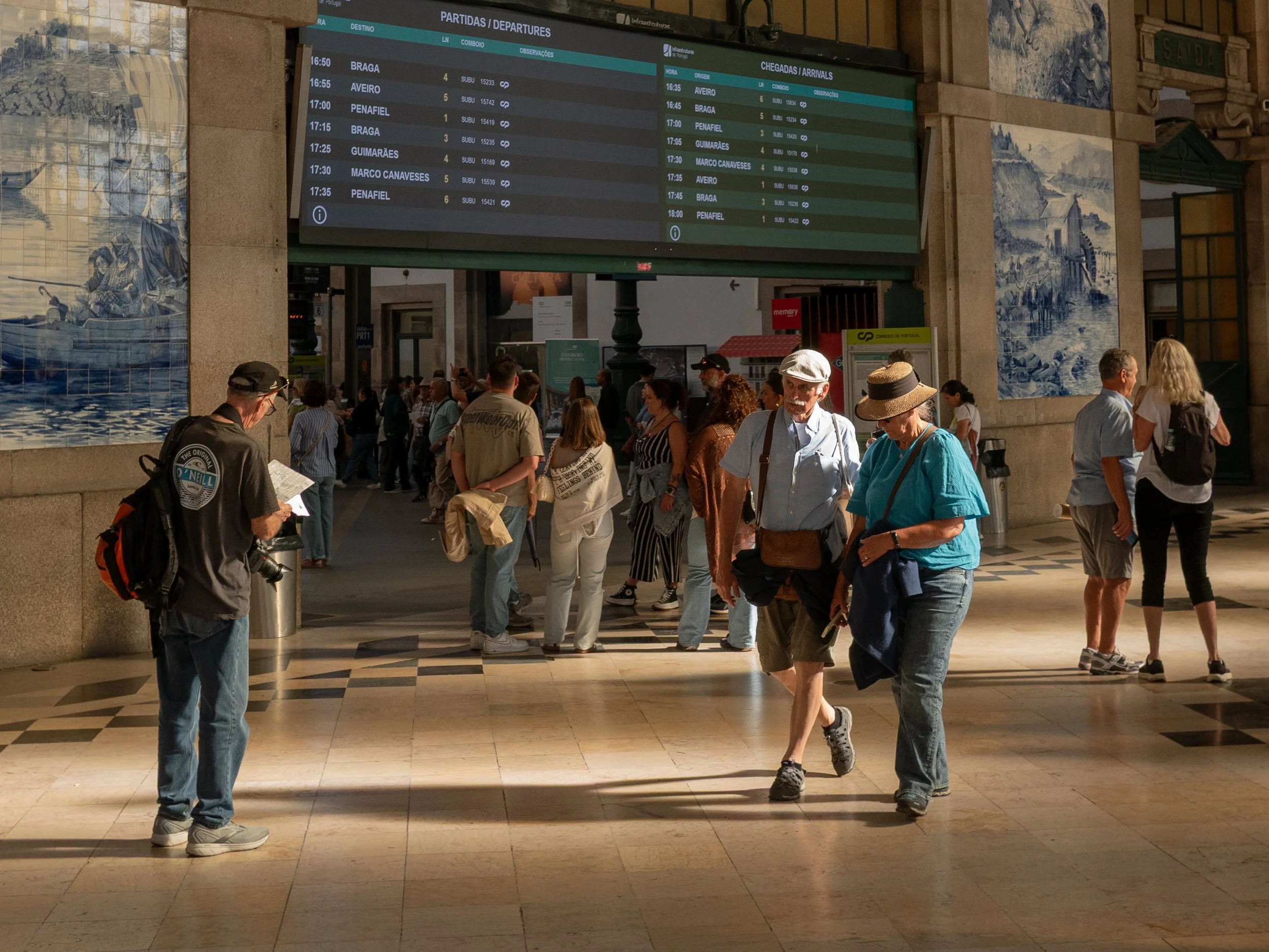 Older couple at the Sao Bento Station in Porto