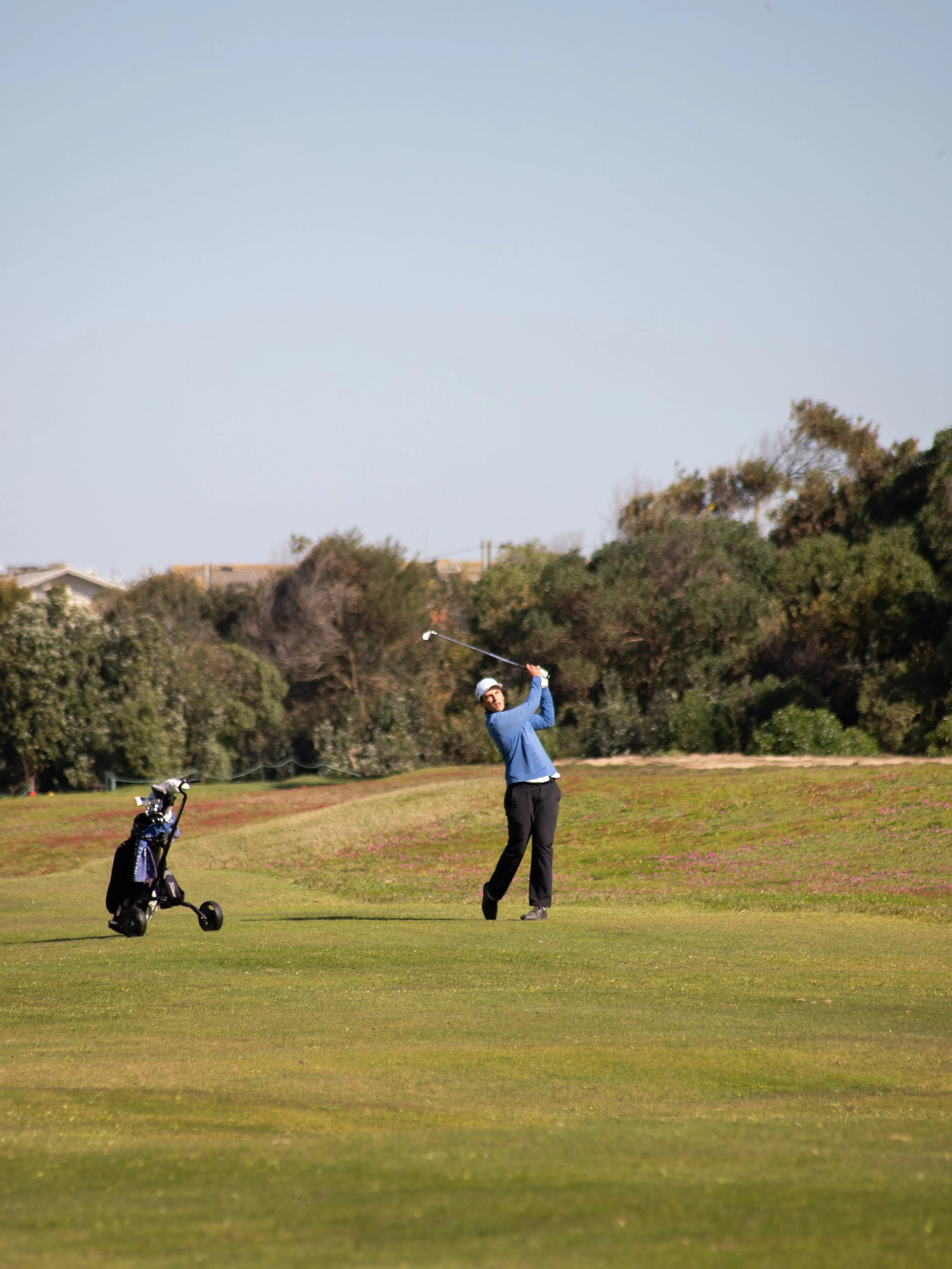 golf player in his approach shot