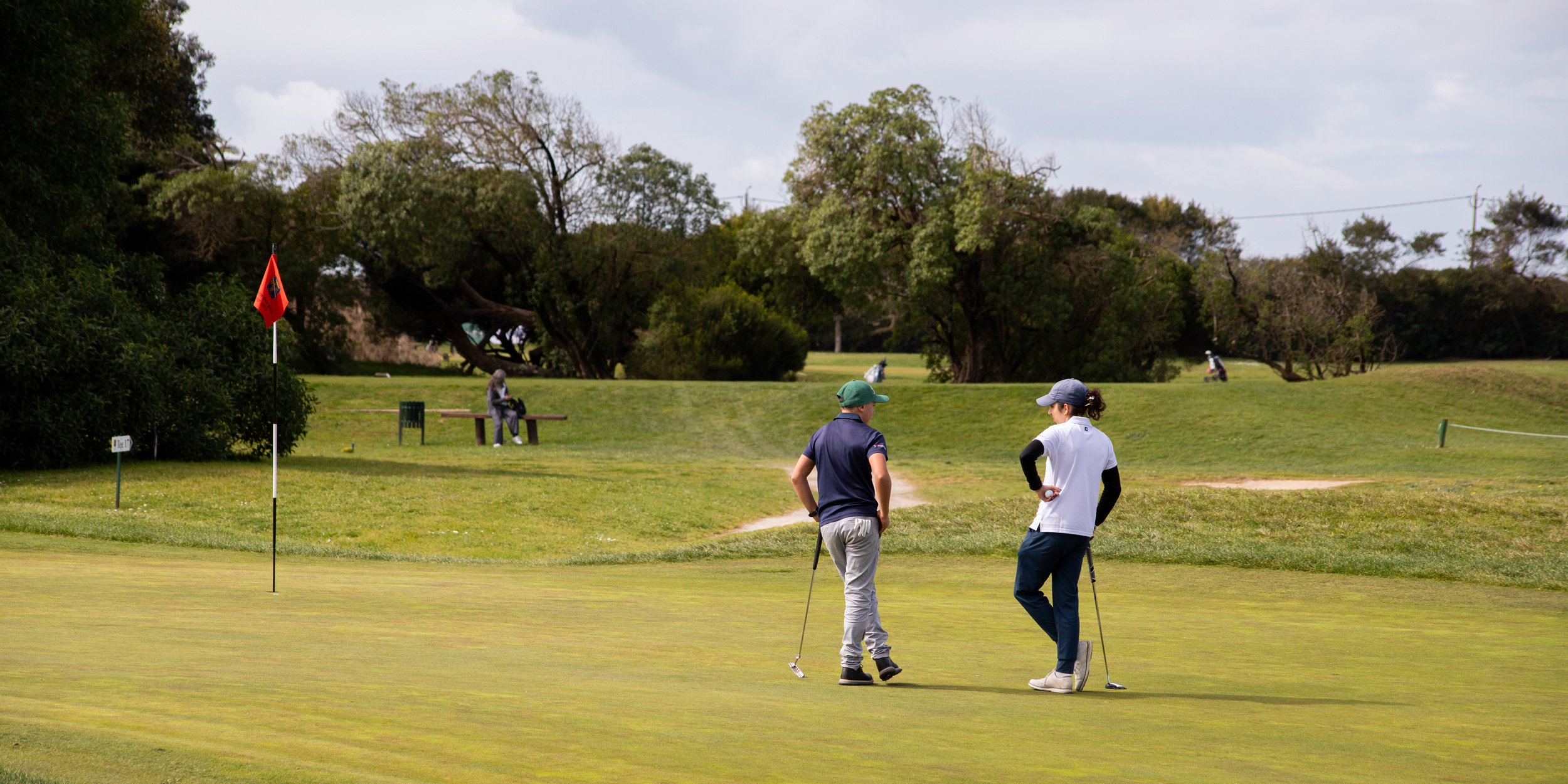 golf friends talking