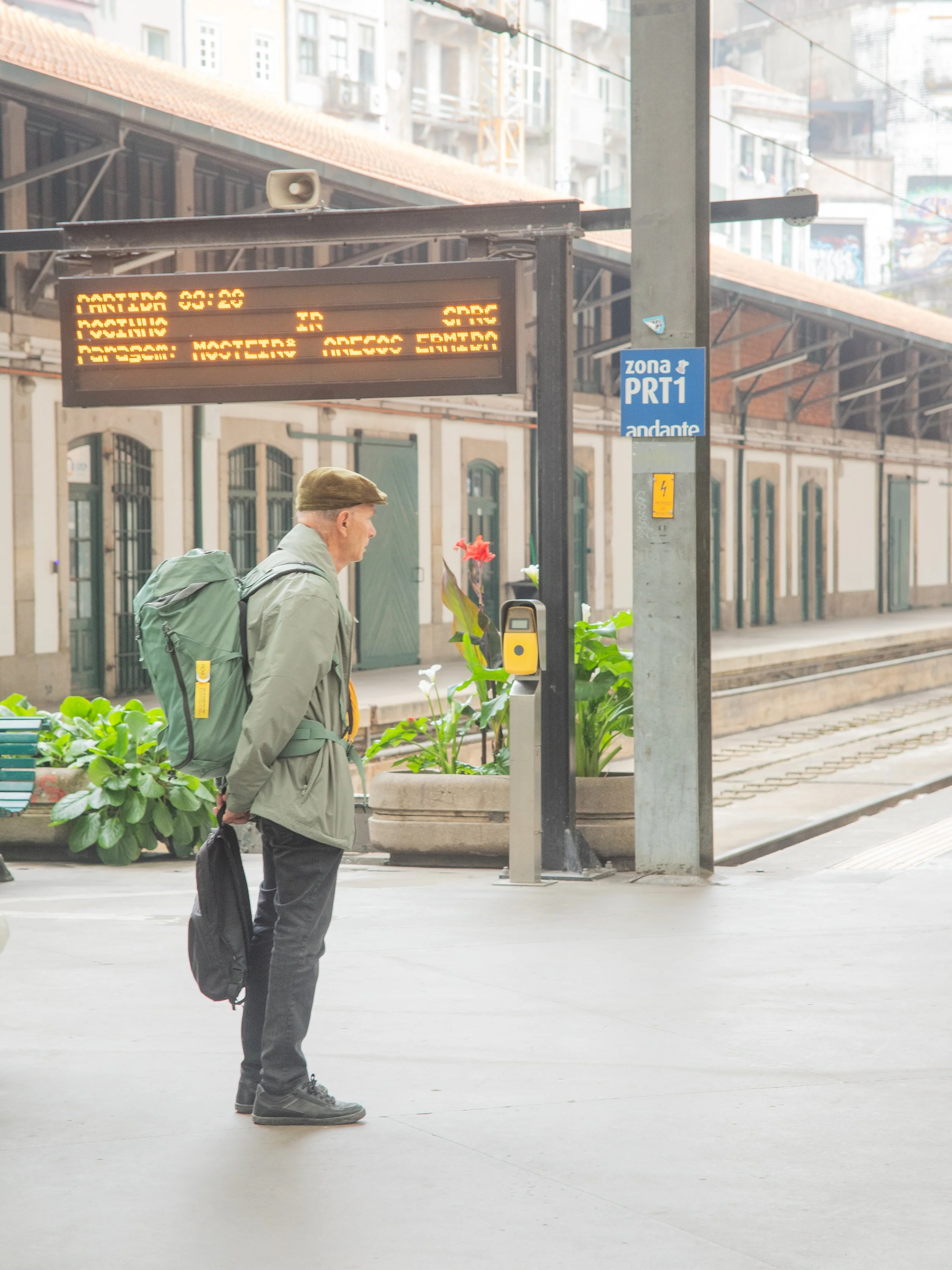 man waiting for his train