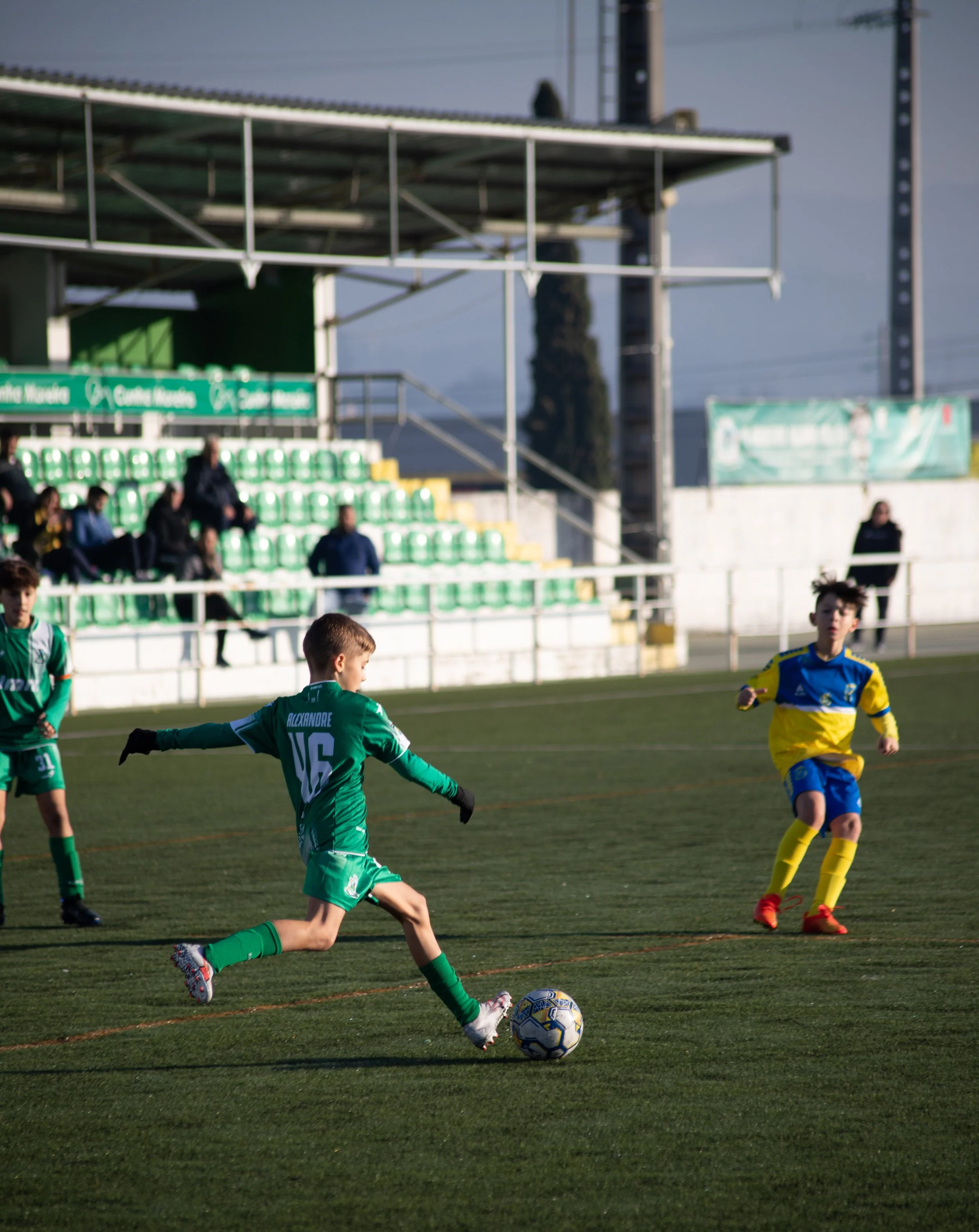 soccer player hitting the ball