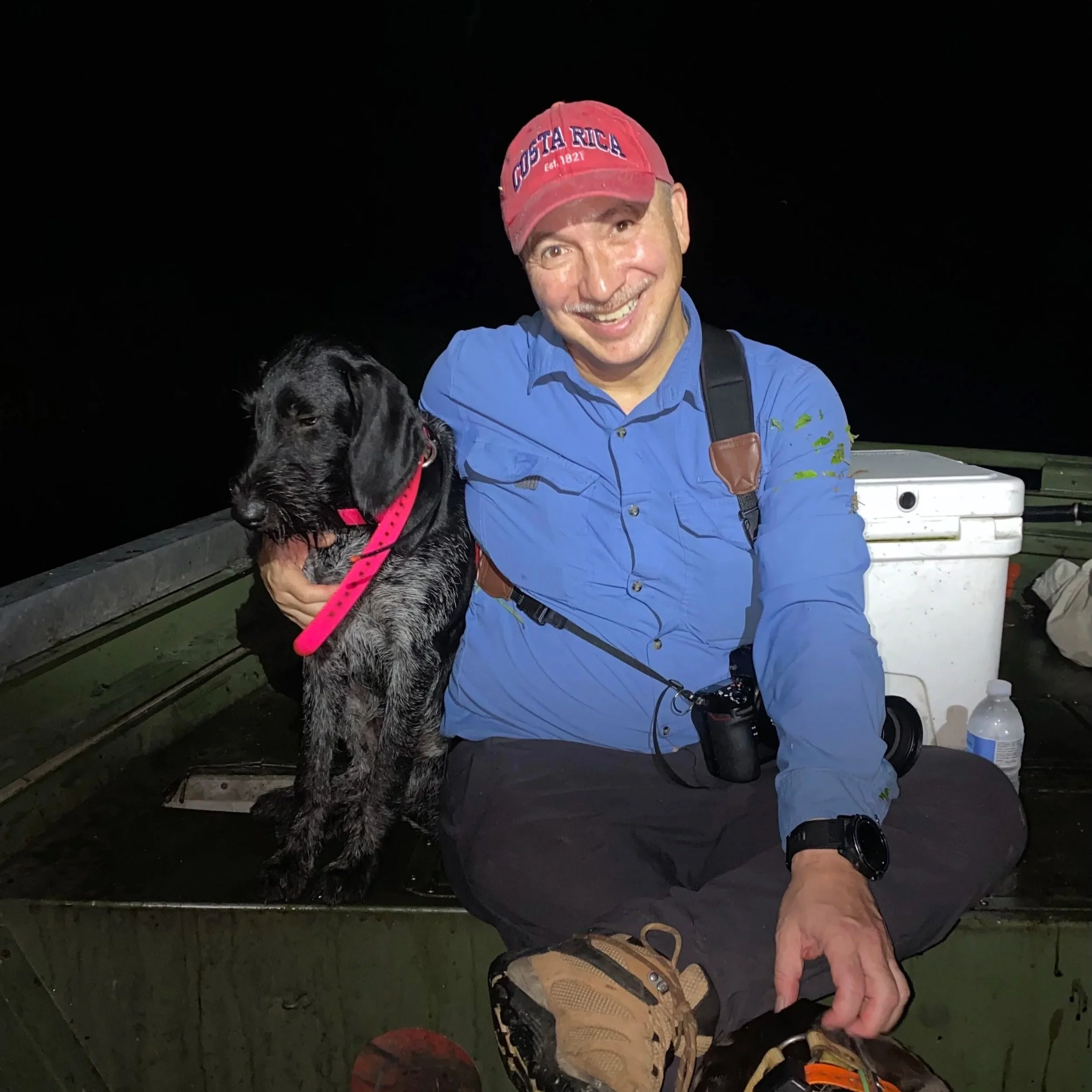 Ian with Arti and Fenix while looking for pythons in the Florida Everglades