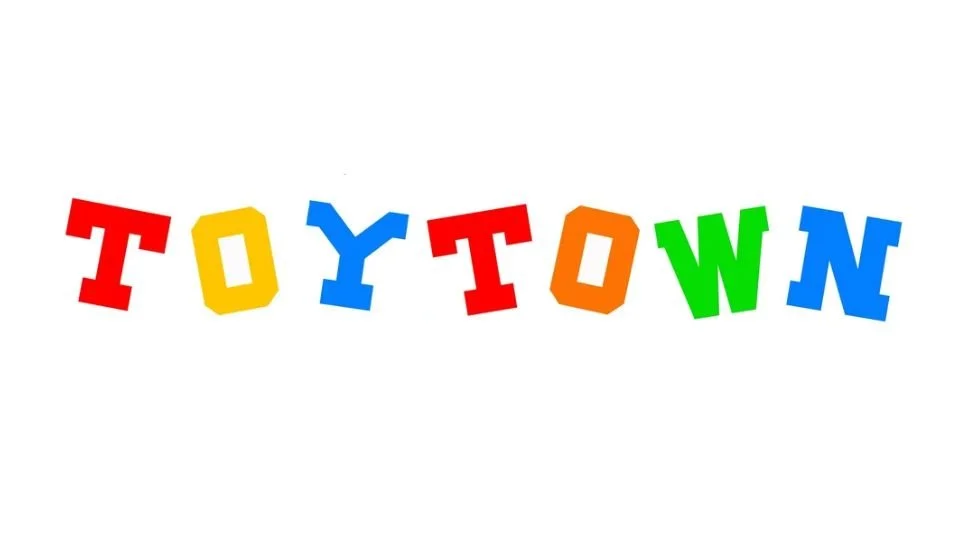 Colorful letters spelling out "TOY TOWN" on a white background.