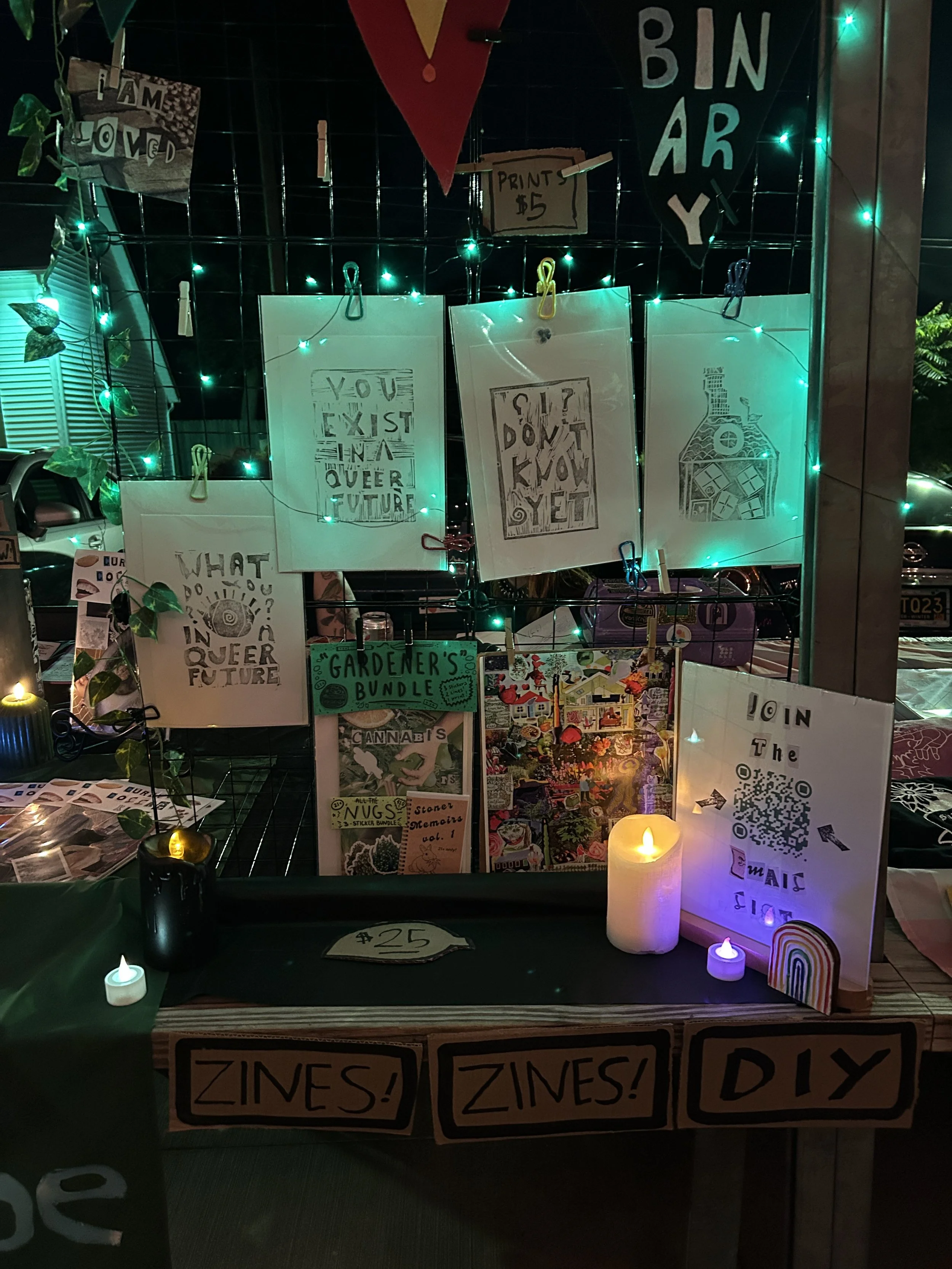 Night shot of illuminated table at TransFuse Night Market , September 2025