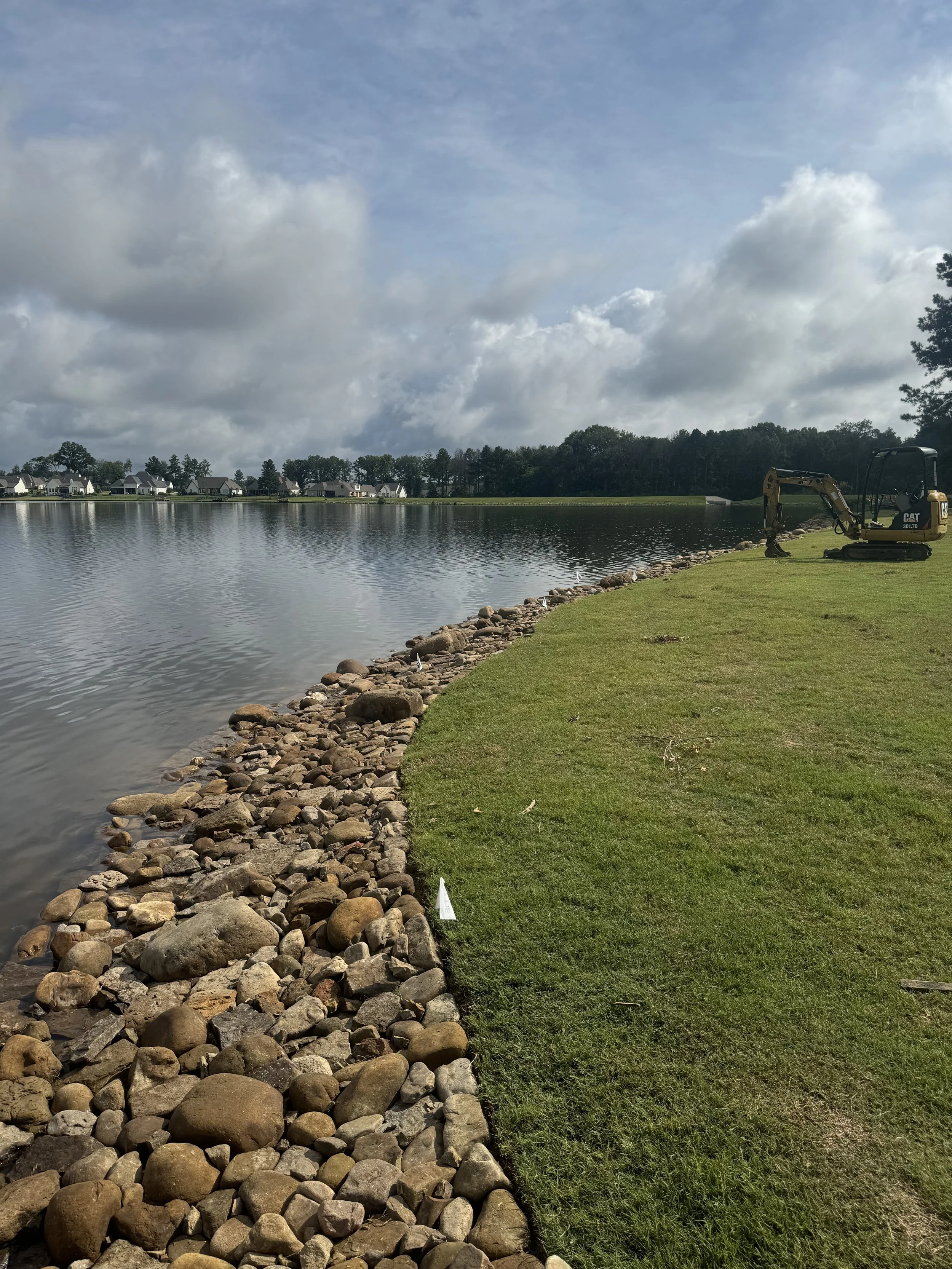Stone shoreline installation in Mississippi protecting waterfront property
