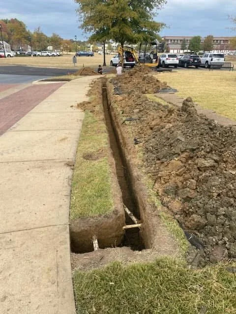 French drain installation in Jackson MS residential yard