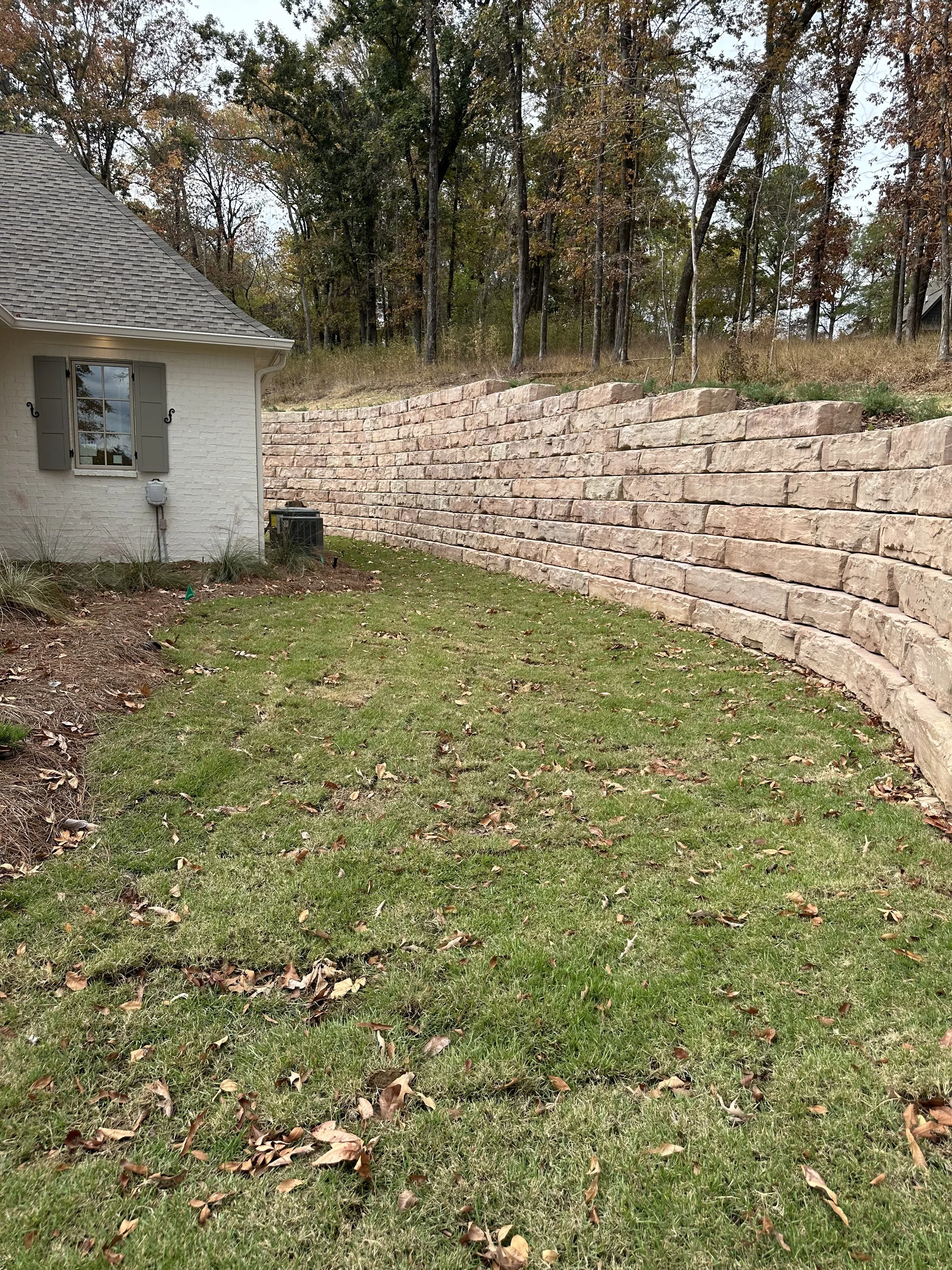 Residential retaining wall installations improving yard