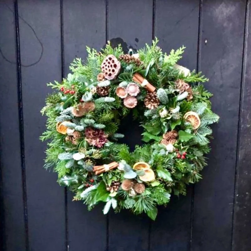 a wreath made of green foliage