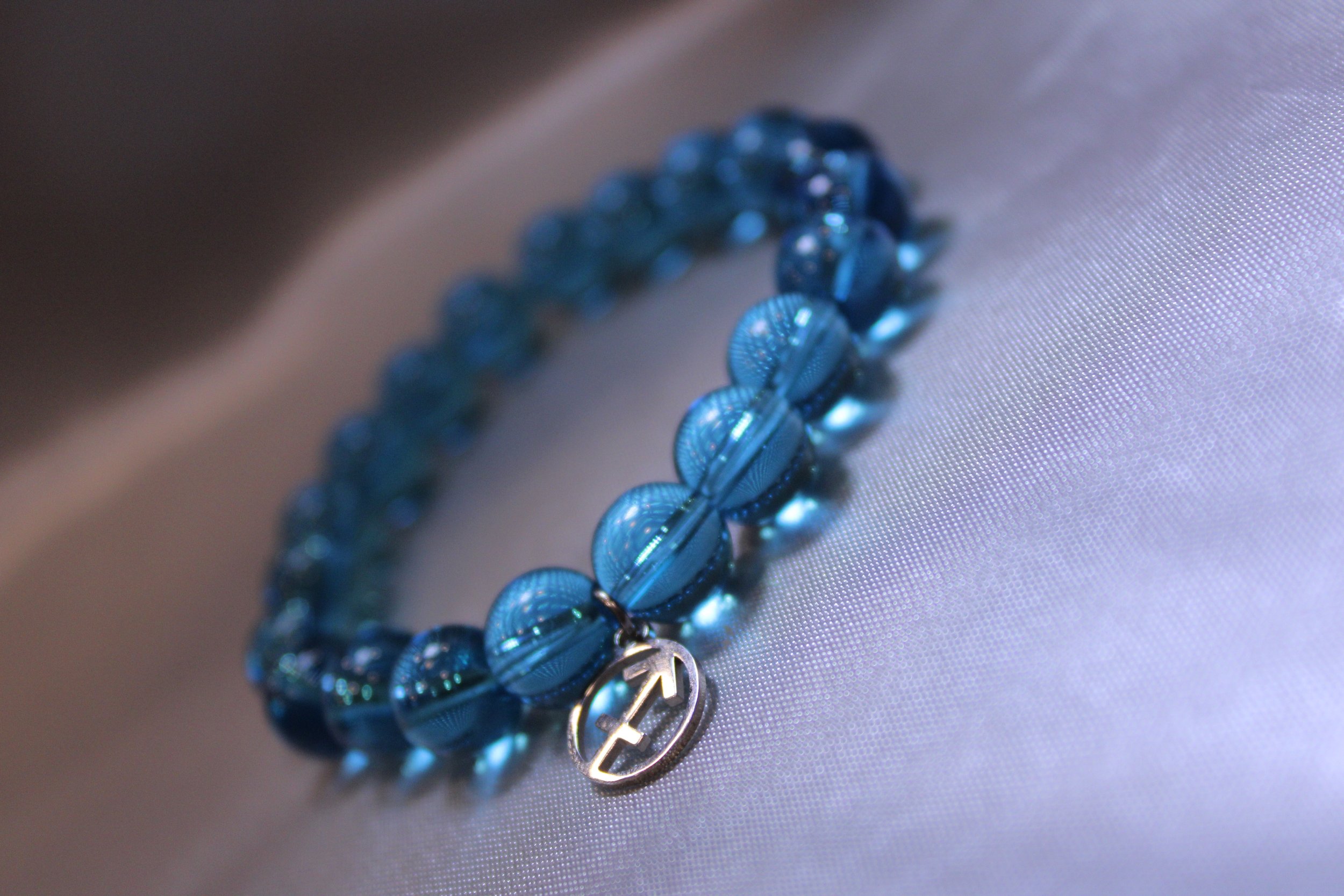 Turquoise/December: Sagittarius (November 22 - December 21)