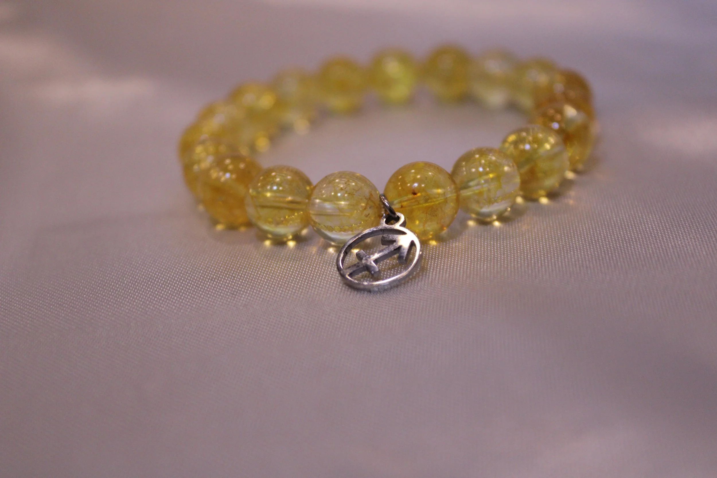 Yellow Topez/November: Sagittarius (November 22 - December 21)