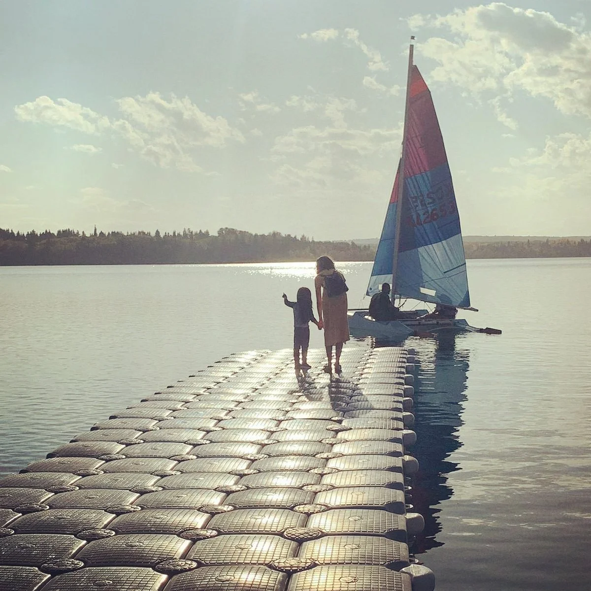 Aaeena dock with sail boat and child adolescent counselling