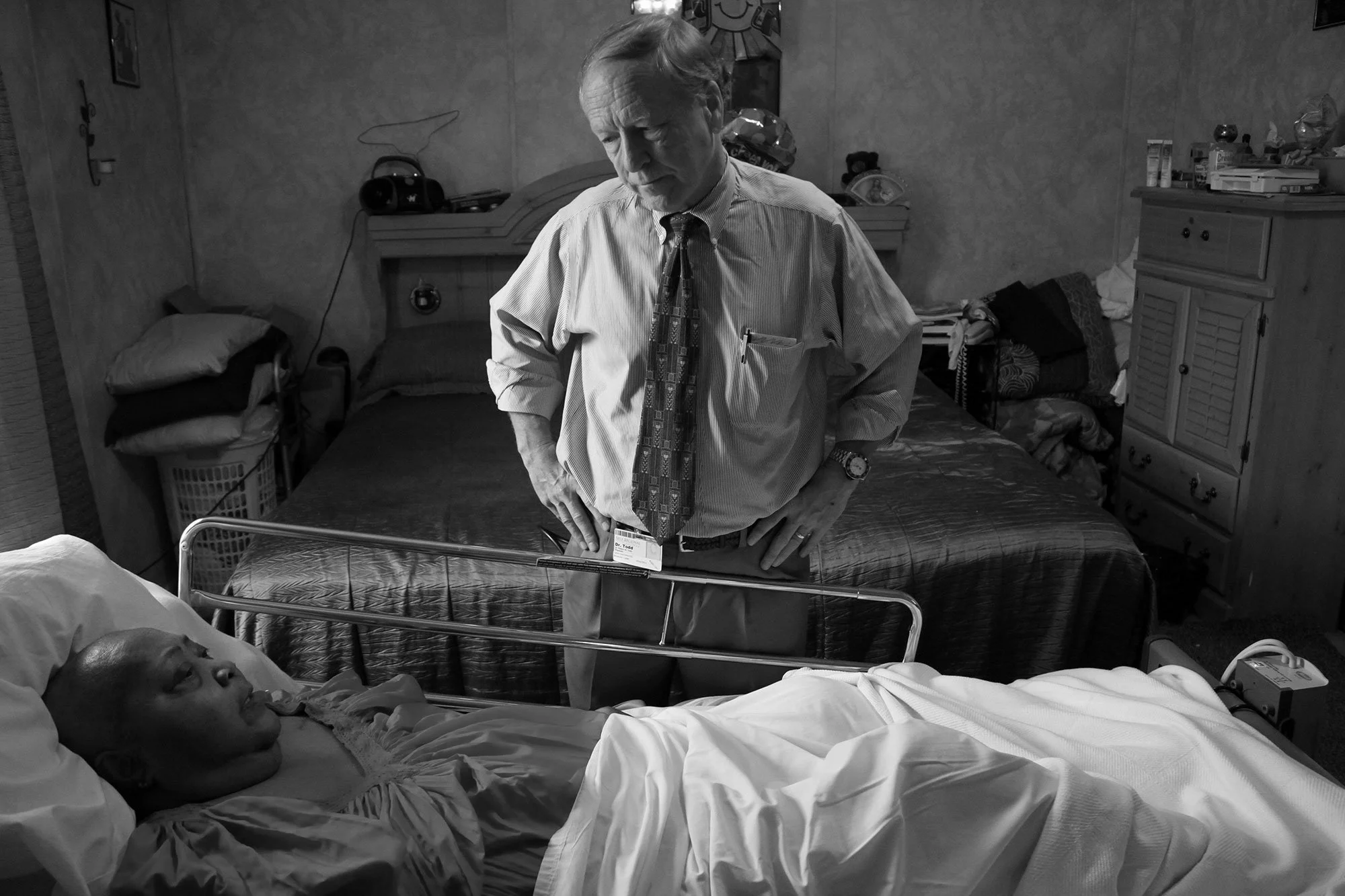 Dr. Bob W. Todd speaks to  Walla Wilson in her home to determine if she is eligible for physical therapy, which HospiceCare of the Piedmont cannot provide. Todd is the medical director of HospiceCare of the Piedmont and makes in-home visits to patien