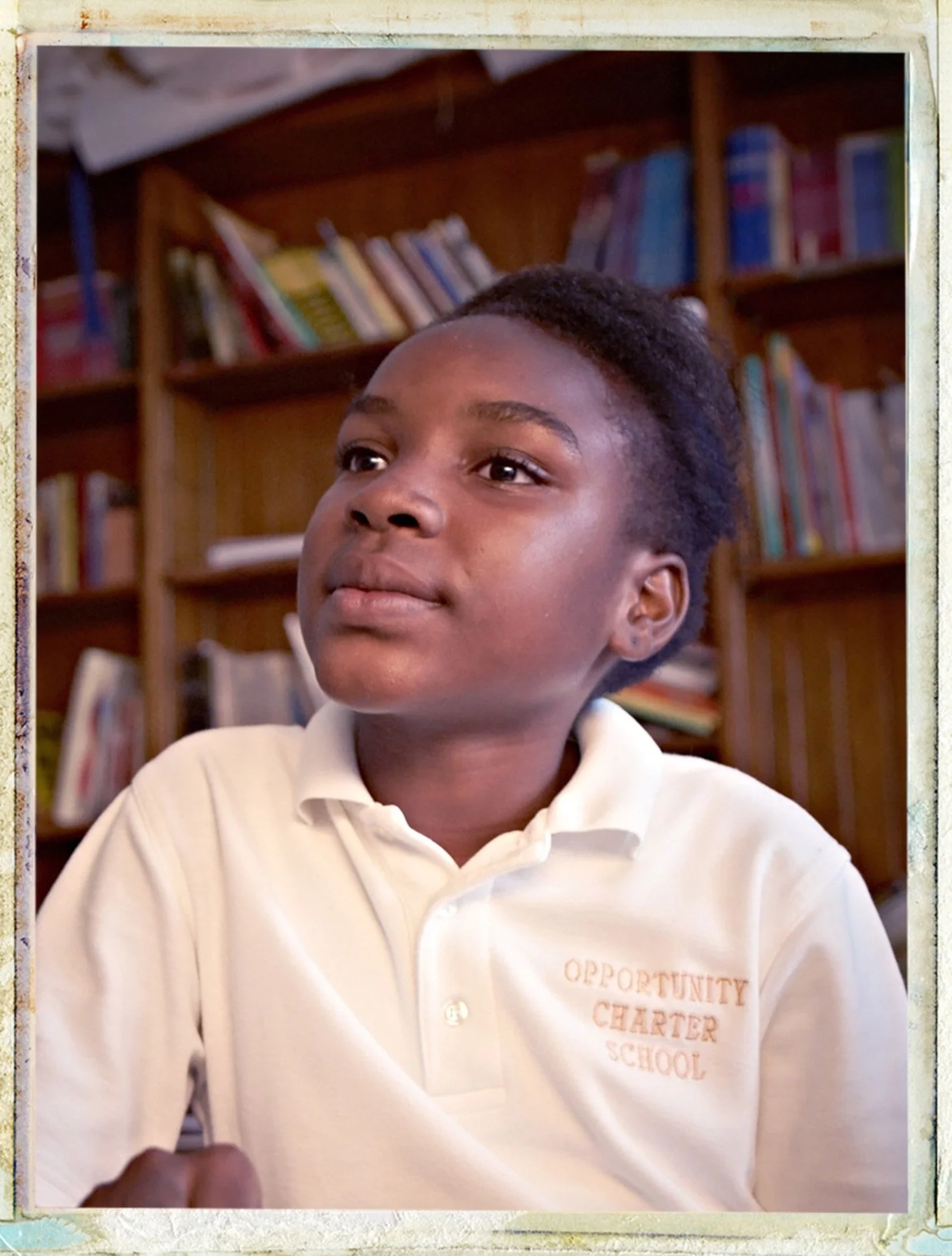 charter-school-student-portrait-bookshelves-mister-lynch-photography.jpg