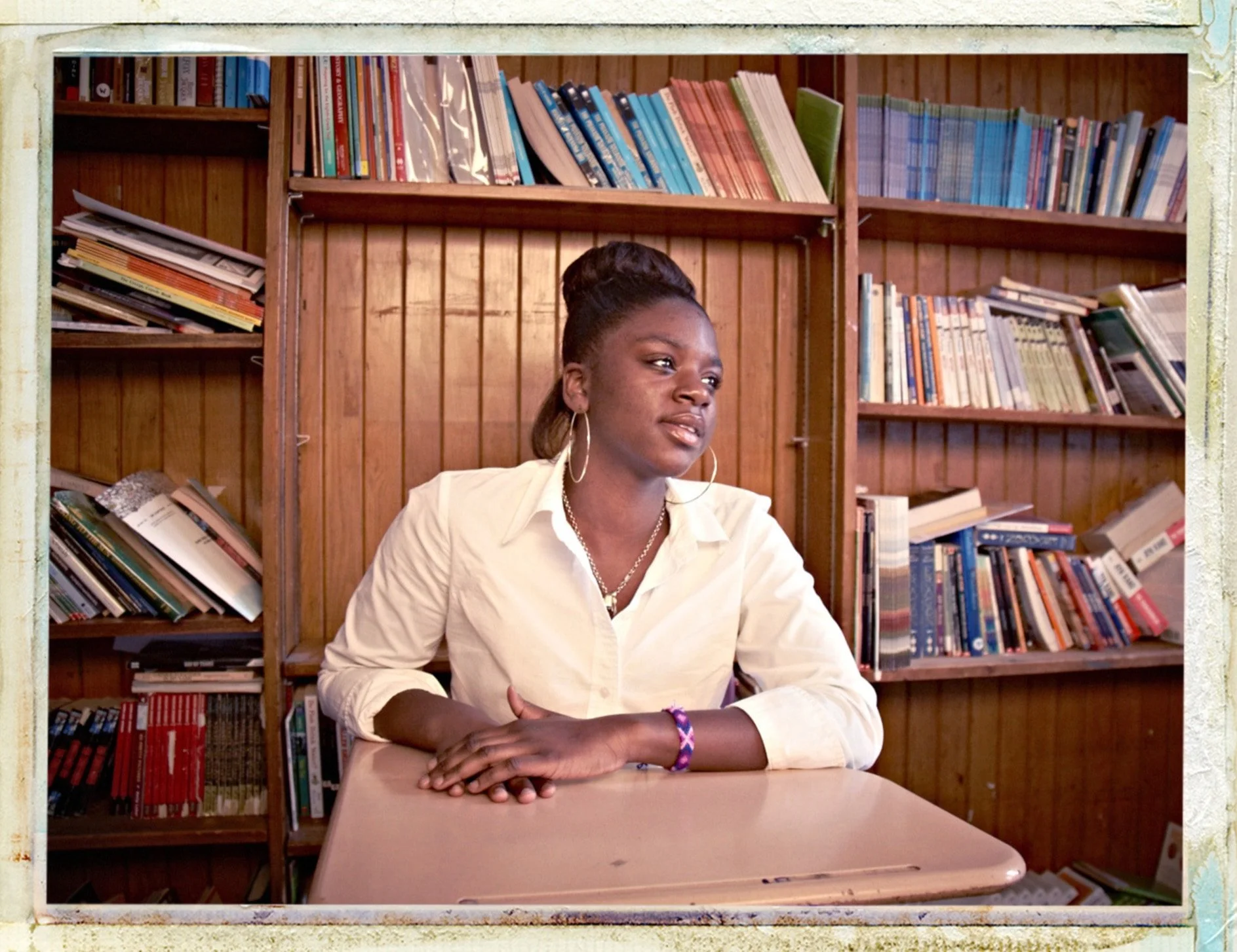 charter-school-student-portrait-school-library-desk-mister-lynch-photography.jpg