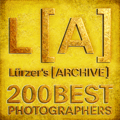 Book cover titled 'Lürzer's Archive 200 Best Photographers' with gold text on a textured gold background.