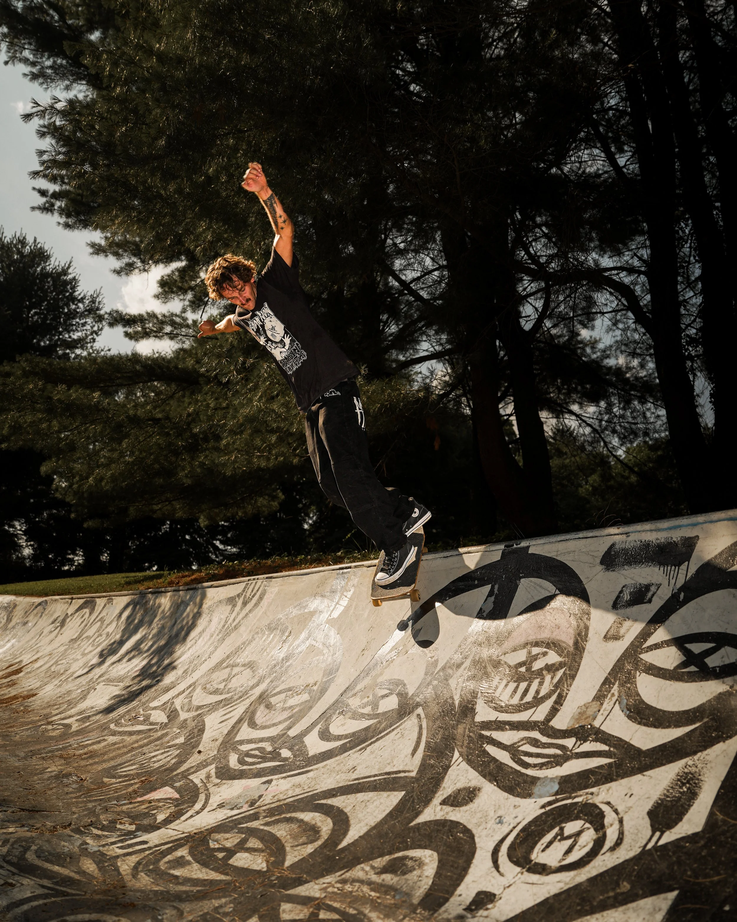 Professional skateboarder Nick Day performing a frontside grind at Bam Margera's private skatepark during a commercial action sports production by Threadline Collective.