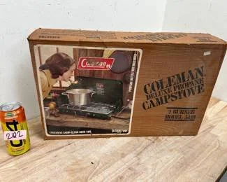 A vintage Coleman Deluxe Propane Campstove listed in an online auction in st louis