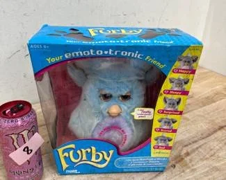 A vintage Blue Furby listed in an online auction in st louis