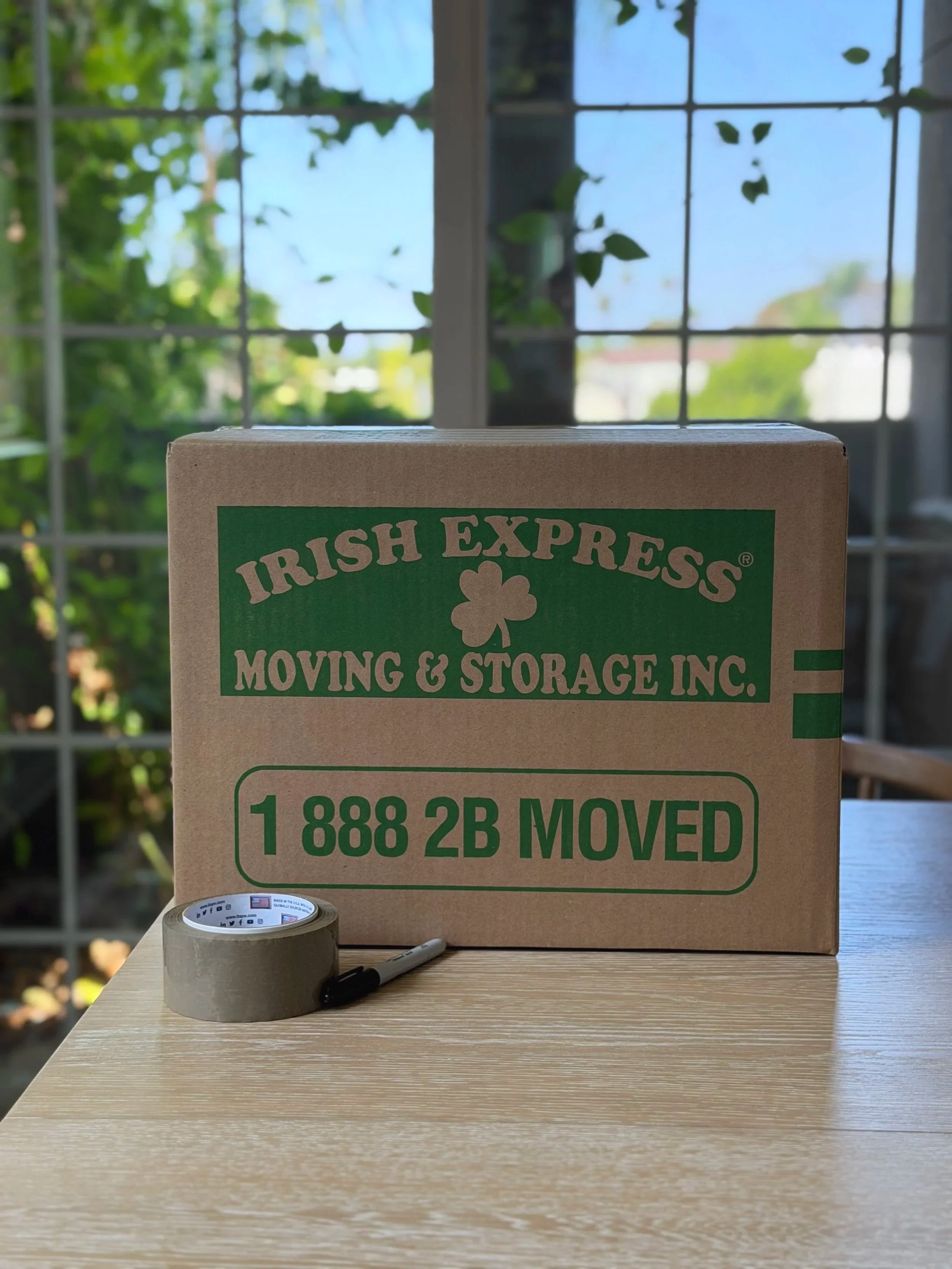 Irish Express Moving box with packing tape and sharpie
