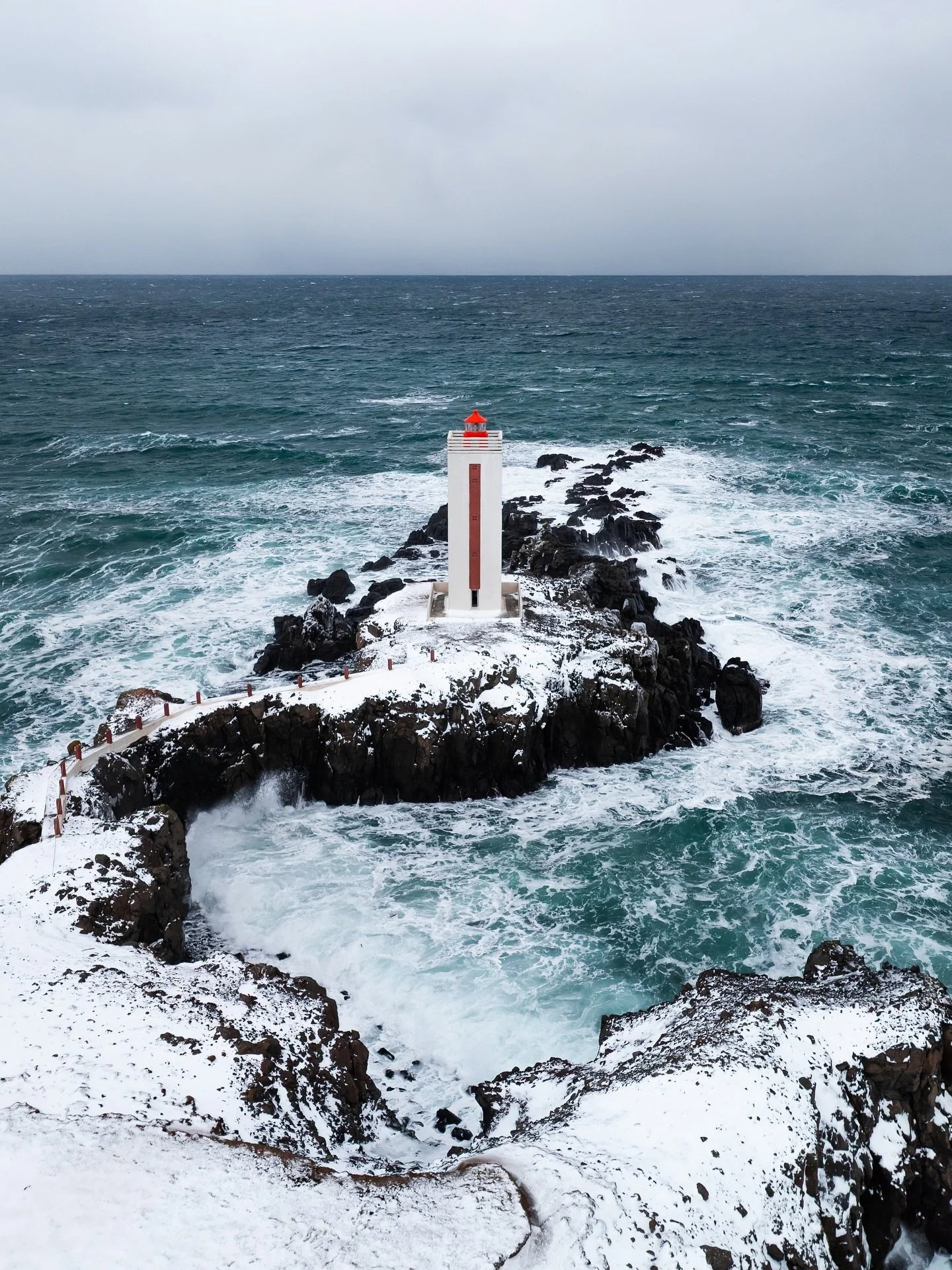 The old lighthouse at Bakkafj&ouml;r&eth;ur, called Digranesviti, has stood here since the 1940s. It sits on the edge of the cliffs, facing the North Atlantic, about a short walk from the village. Hard to imagine a lonelier place to stand guard, but 