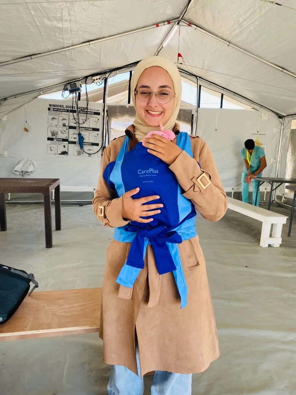 GINA training on premature infant sling.jpeg