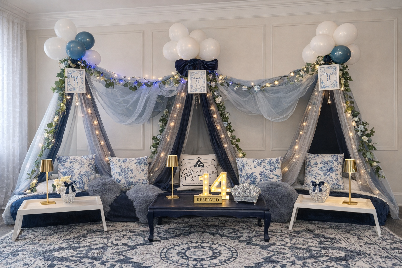 A collection of blue decorative items: a large satin bow, embroidered pillowcases, a satin pillow, and painted flowers.