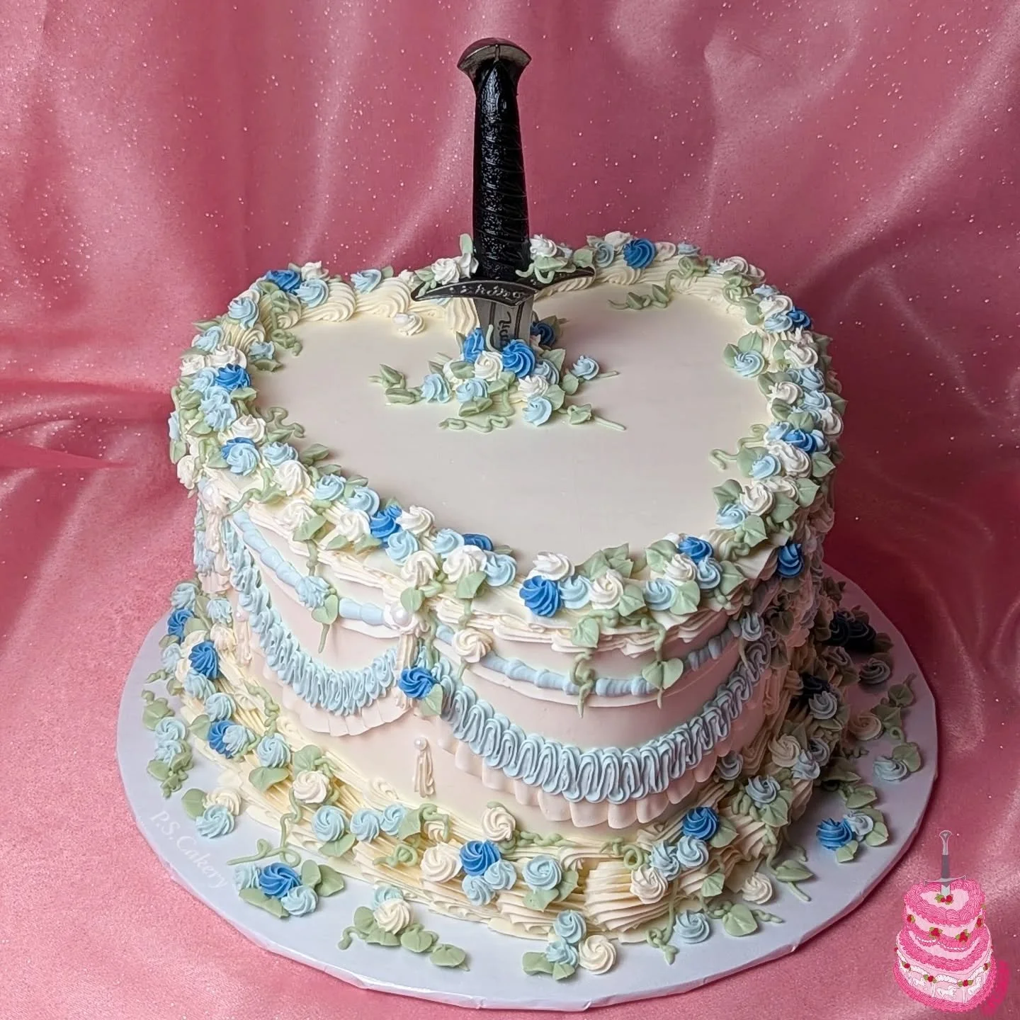 One of my most favorite recent cakes in my camera roll, I was so happy to make this one for a really sweet couple 🗡️🤍

I have been so busy with back to back weekend events and right now I'm already buckling down for a busy week of cake orders, so j