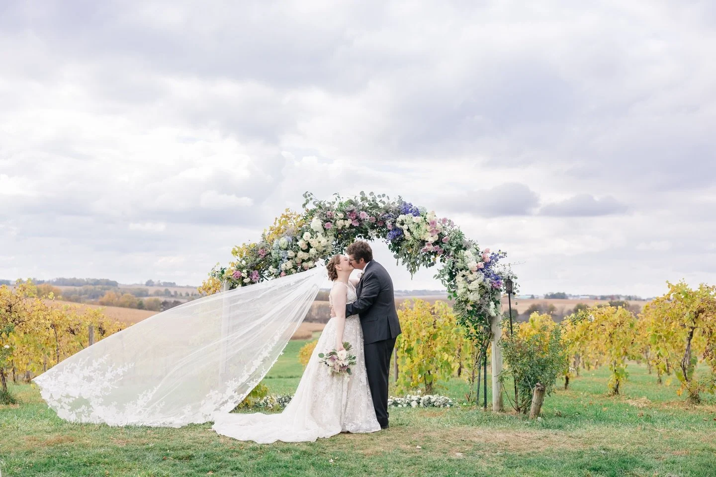 To have. To hold. And to kiss!💋 

#outdooriowawedding #iowacitywedding #radfordfloraldesign #iowawineryweddings #weddingarbor 

Photo: @emilycrall 
Venue: @walker.homestead 
Floral: @floraldesignsbyglen