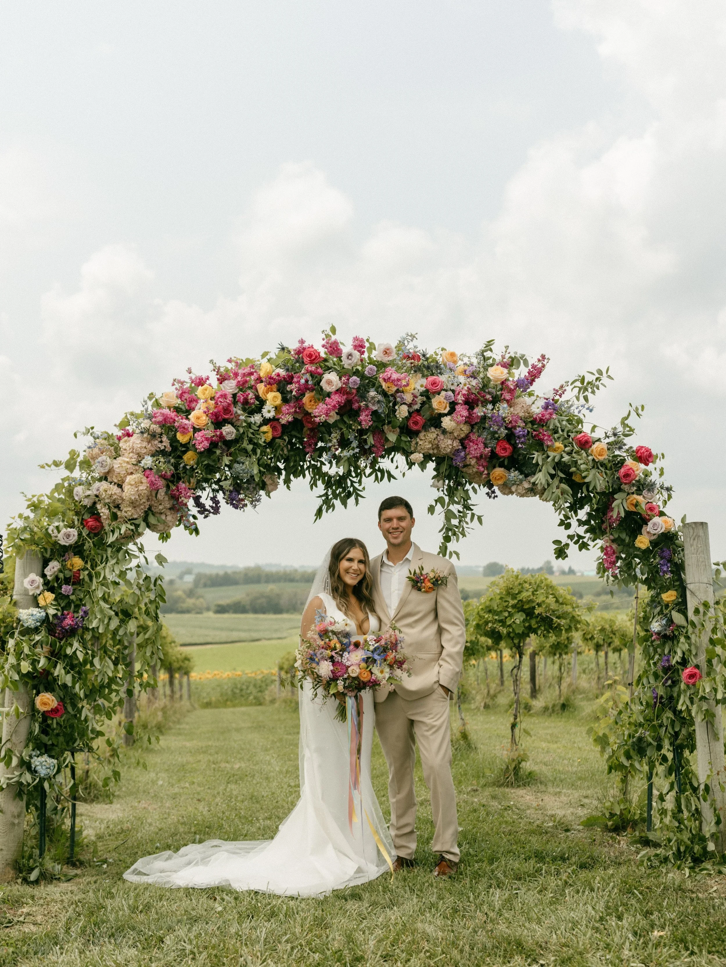 The definition of a summer wedding.

#summerwedding #iowacitywedding #iowasummer #iowawineryweddings #summercolorfulwedding 

Photo: @kyndalelisephotography 
Venue: @walker.homestead 
Gown: @moderndress 
Floral: @floraldesignsbyglen