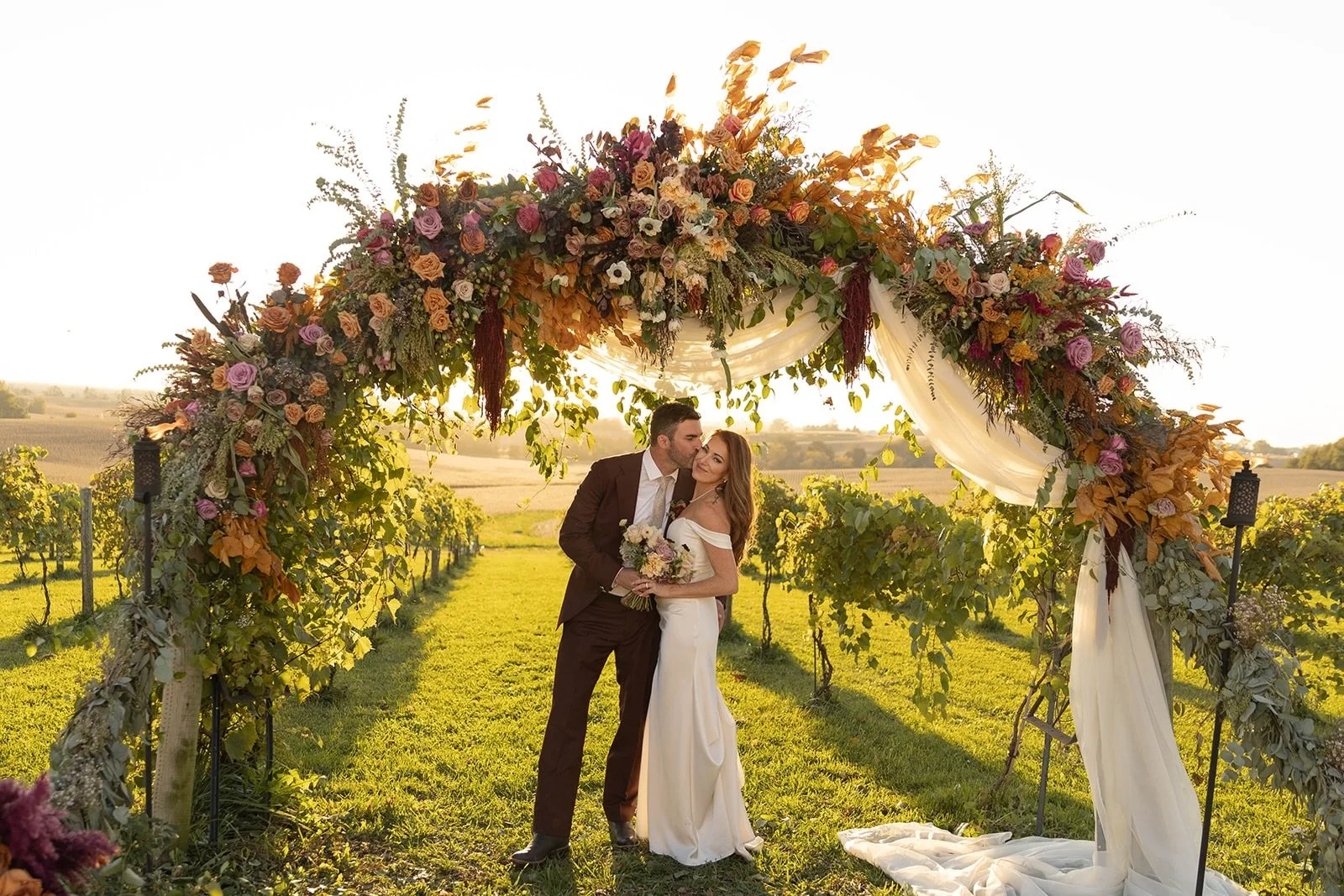 Arch you glad you didn&rsquo;t skip on ceremony flowers?!

But for real, a moment for the two beautiful souls that said, &ldquo;Glen, we trust you and we want you to go for it on the arch!&rdquo;

As always, stunning photos from @megankrystalphoto 
a
