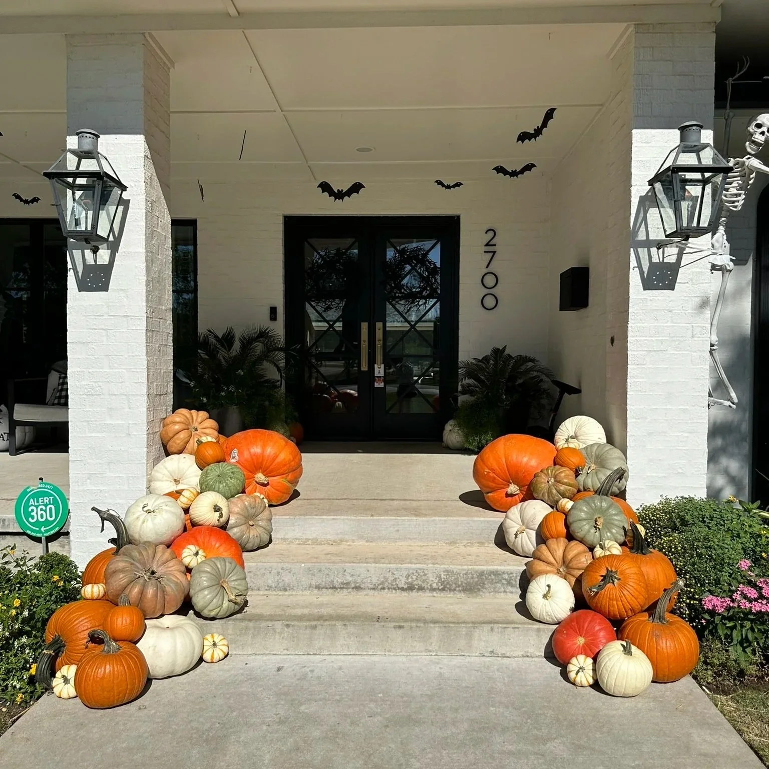 Expansive porches, wraparound designs, or multi-tiered entries