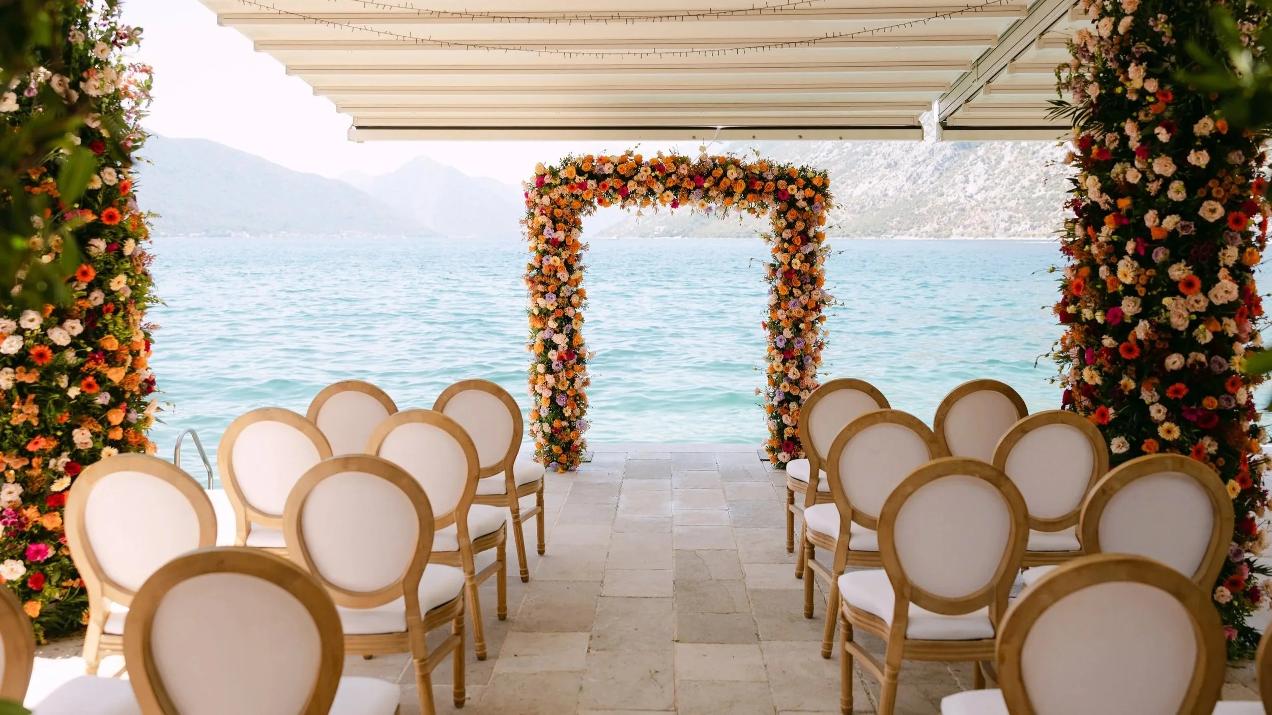 ceremony by the water at a pier in the bay of kotor