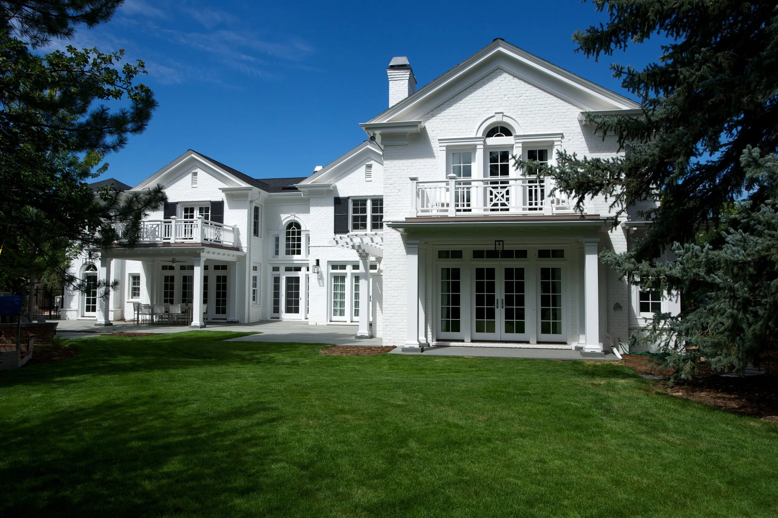 Rear facade of colonial house renovation.