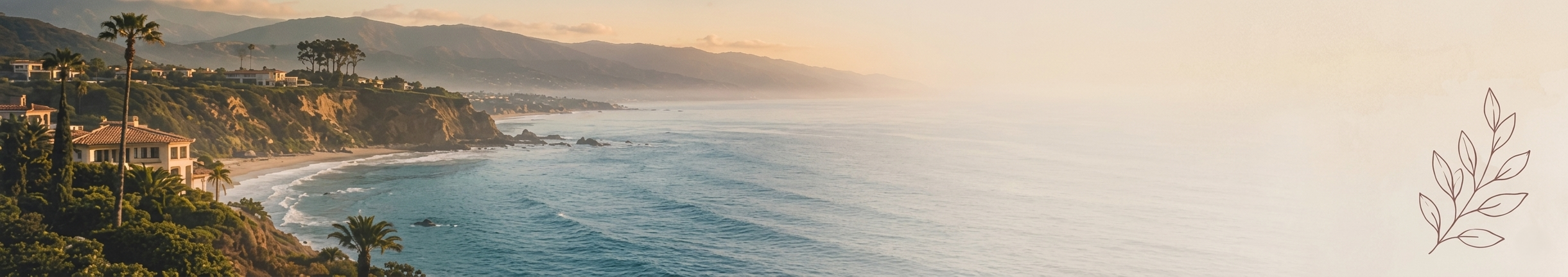 Sunset over a coastal hillside with houses and palm trees overlooking the ocean, distant mountains are visible in the background, and a decorative leaf pattern is on the right side of the image.