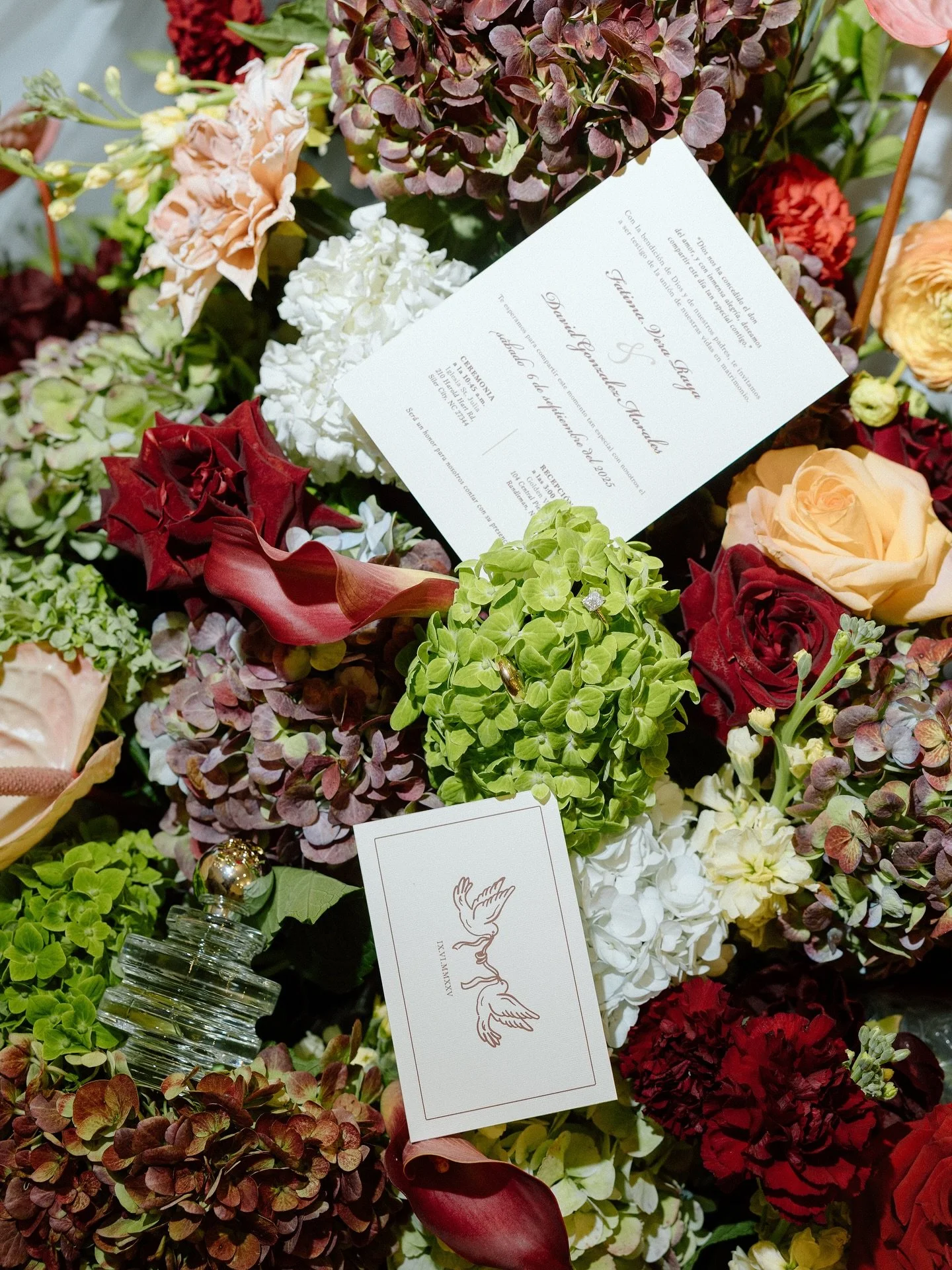 flat lays in a bed of florals will alwaysss make my heart skip a beat // sweet little details to Mrs. + Mr. Morales&rsquo; wedding day 💘 
.
.
.
.

#ncweddingphotographer #charlottewedding #charlotteweddingphotographer  #charlottebrides #raleighbride