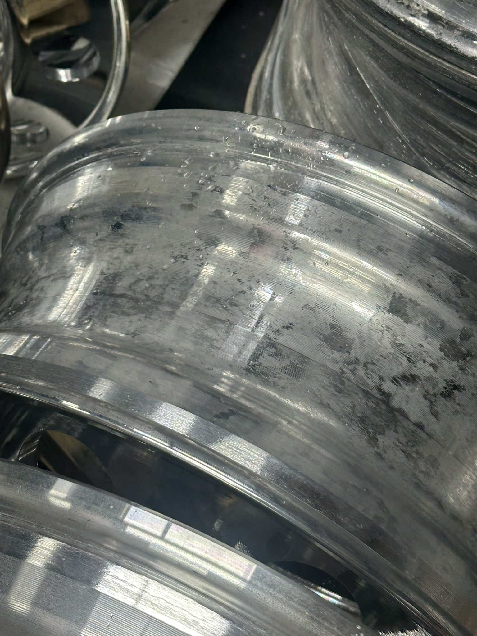 Close-up of aluminum wheels that are milled down from 24.5 to 24 and 22.5 to 22, so that 22 or 24 tires can be mounted on these semi-wheels.
