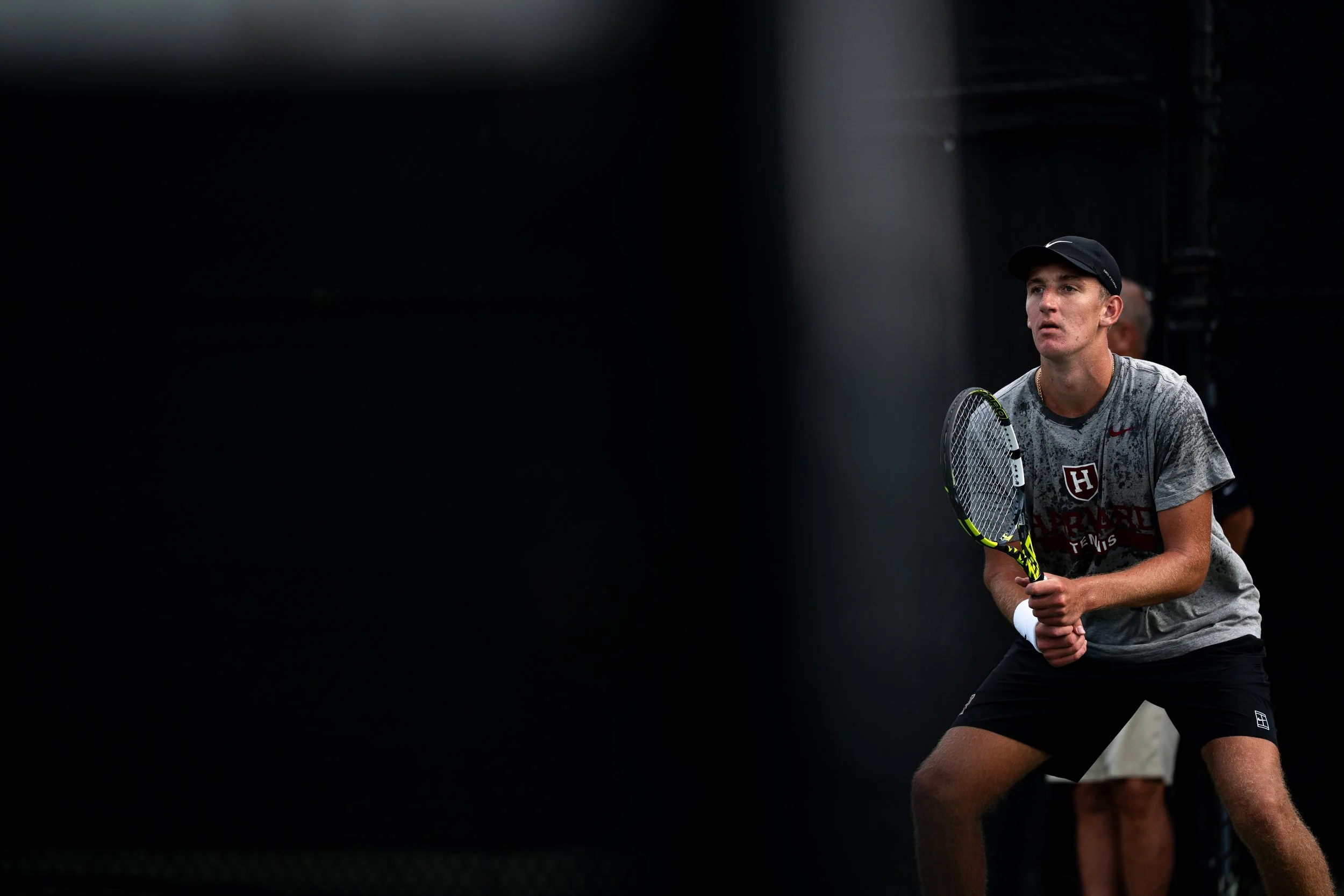 CAMBRIDGE, MASSACHUSSETTS - SEPTEMBER 18: Harvard Men's Tennis's Evan Sharygin awaits a serve at Chowderfest Day One on September 18, 2026. (Photo by Max Elliot/Harvard Athletics)