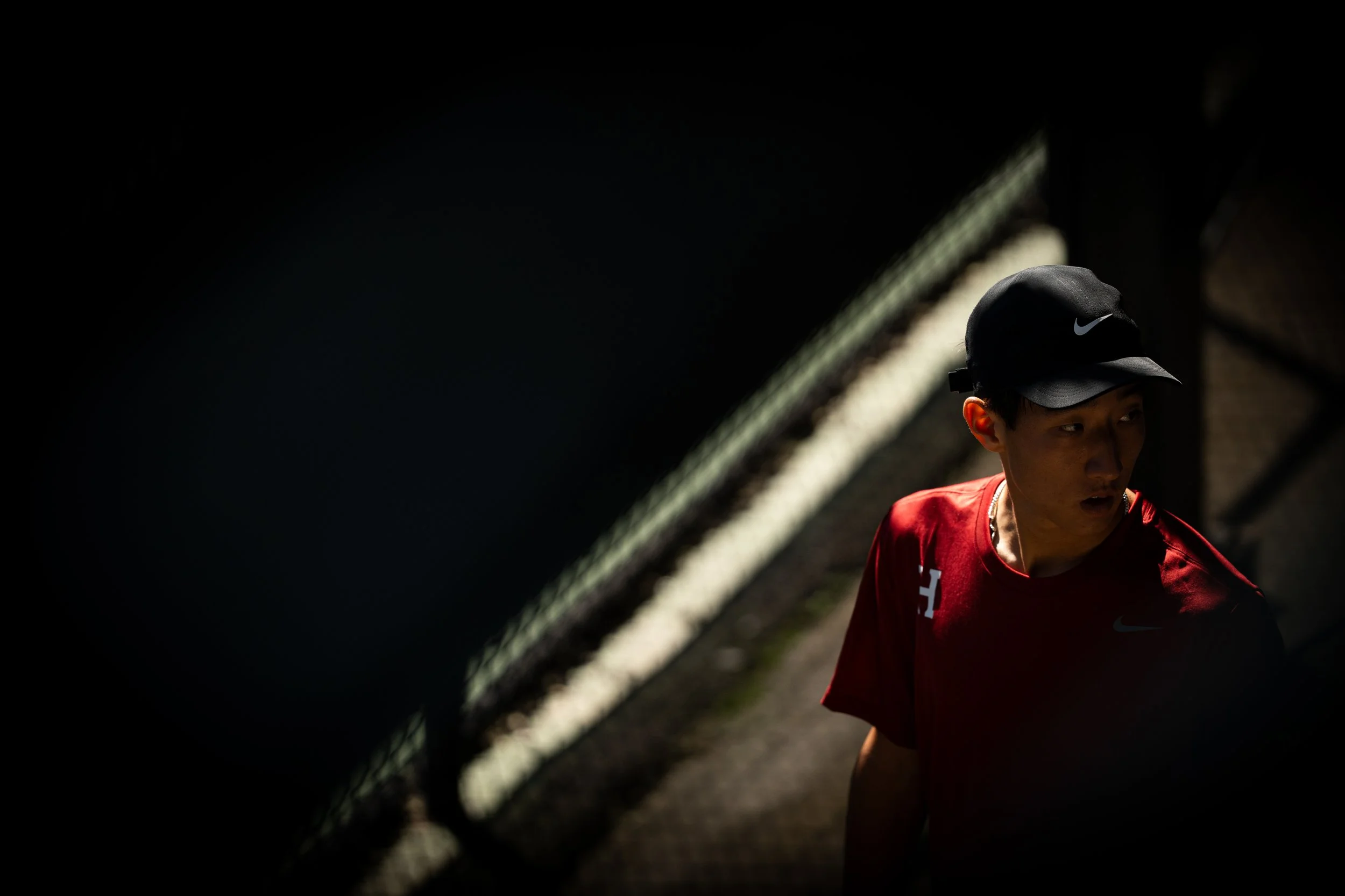 CAMBRIDGE, MASSACHUSSETTS - SEPTEMBER 18: Harvard Men's Tennis's David Wu waits in the tunnel before a match at Chowderfest Day One on September 18, 2026. (Photo by Max Elliot/Harvard Athletics)
