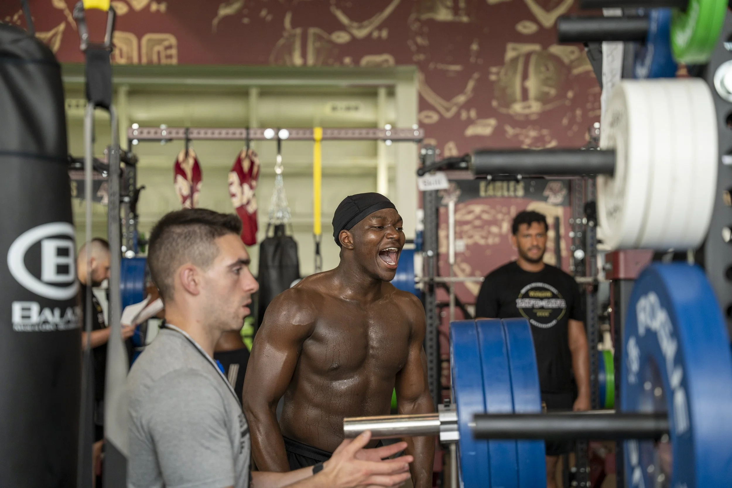 CHESTNUT HILL, MASSACHUSETTS – JUNE 10: Favor Bate celebrates a teammates lift during Boston College Football’s annual Lift for Life event. (Photo by Max Elliot/BC Football)