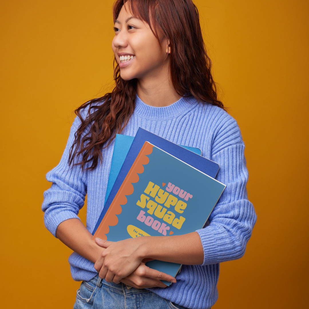Hype-Squad-Book-being-held.png