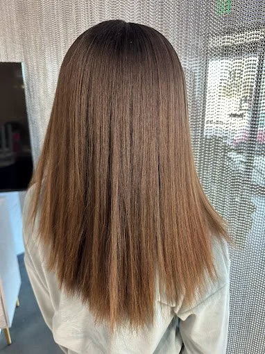 Back view of the precision cuts of a lady/woman.jpg