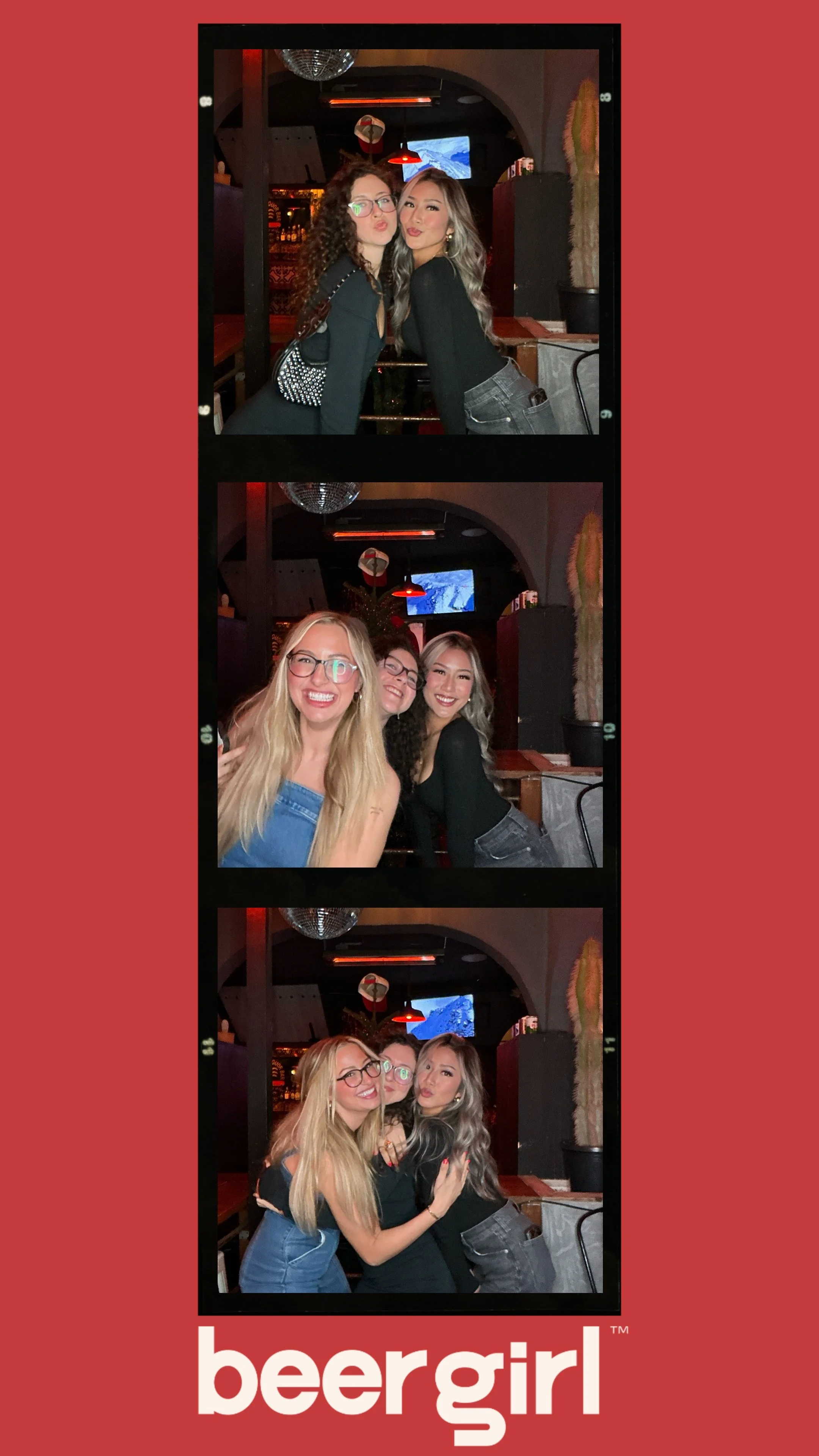 Three women posing in a bar, smiling and hugging, with a "beergirl" logo at the bottom.